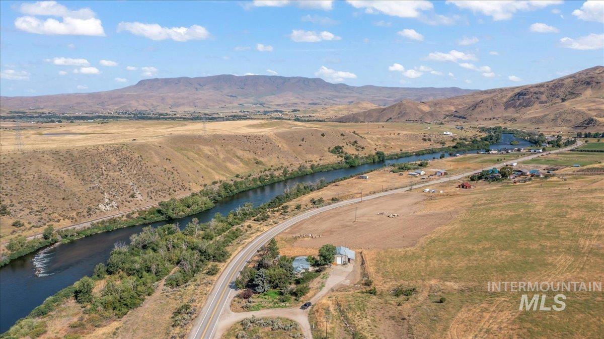 Aerial view of property's location with a view of the river and mountain view and rural landscape