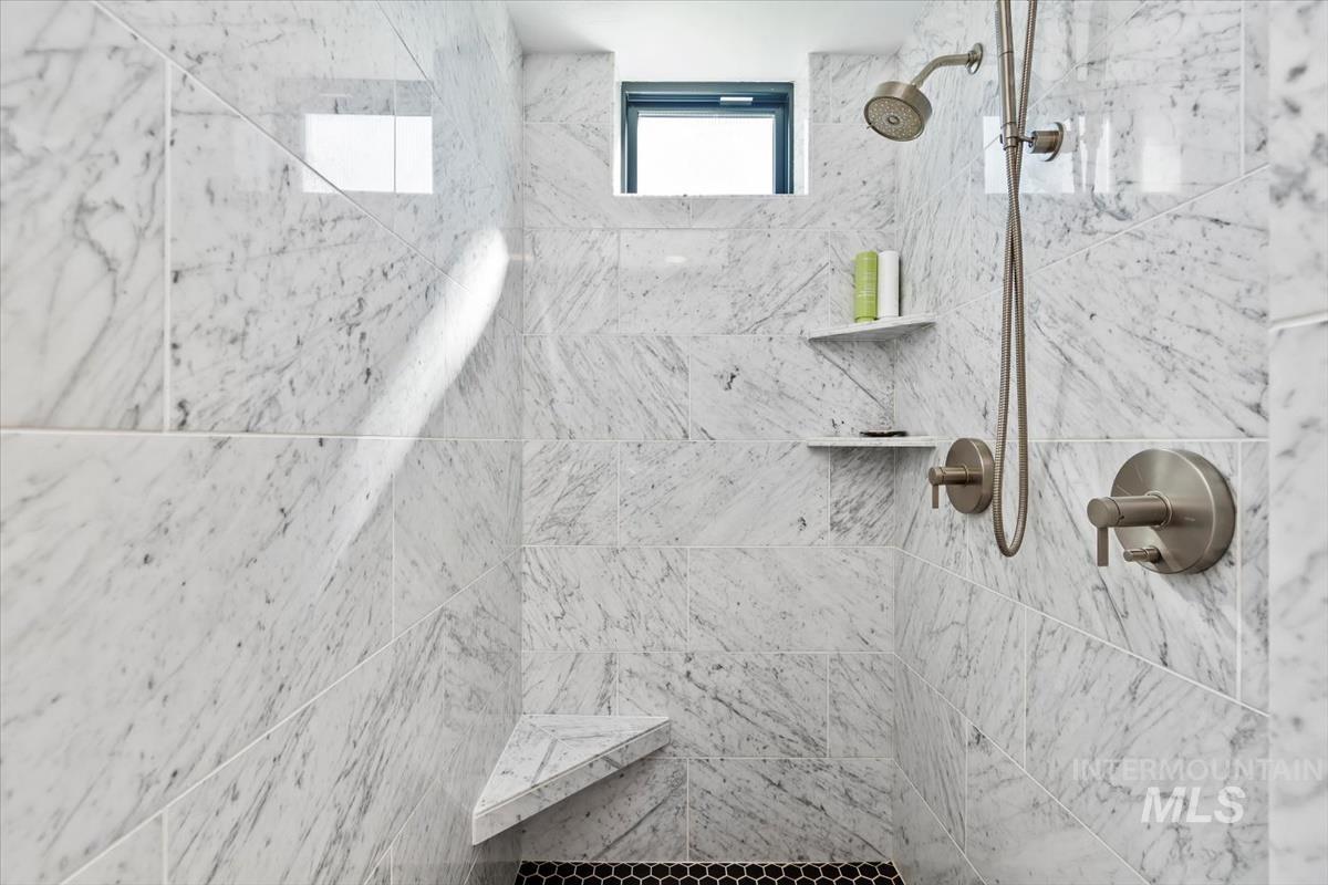 Bathroom with tiled shower