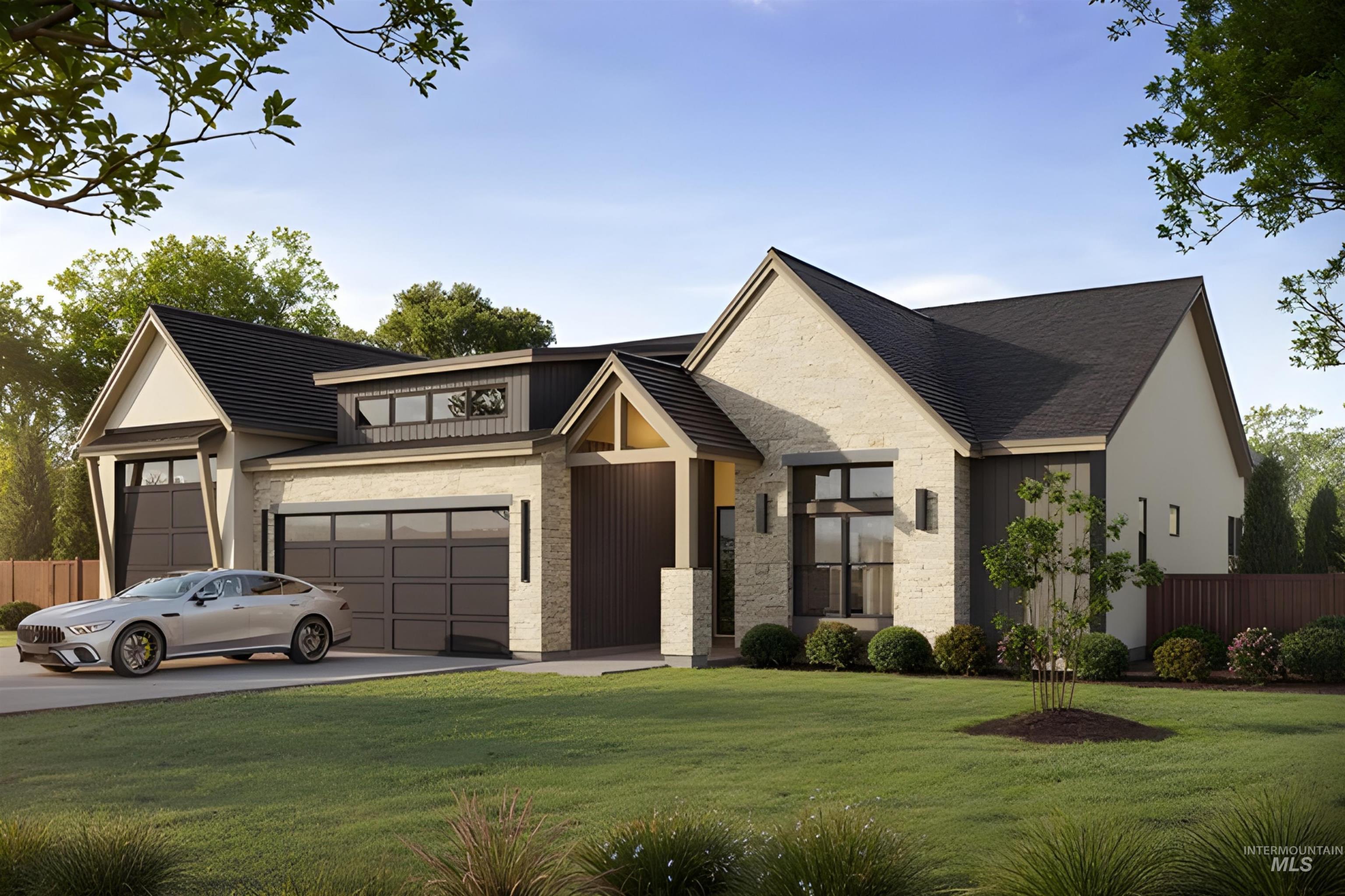 View of front of home featuring stone siding and driveway