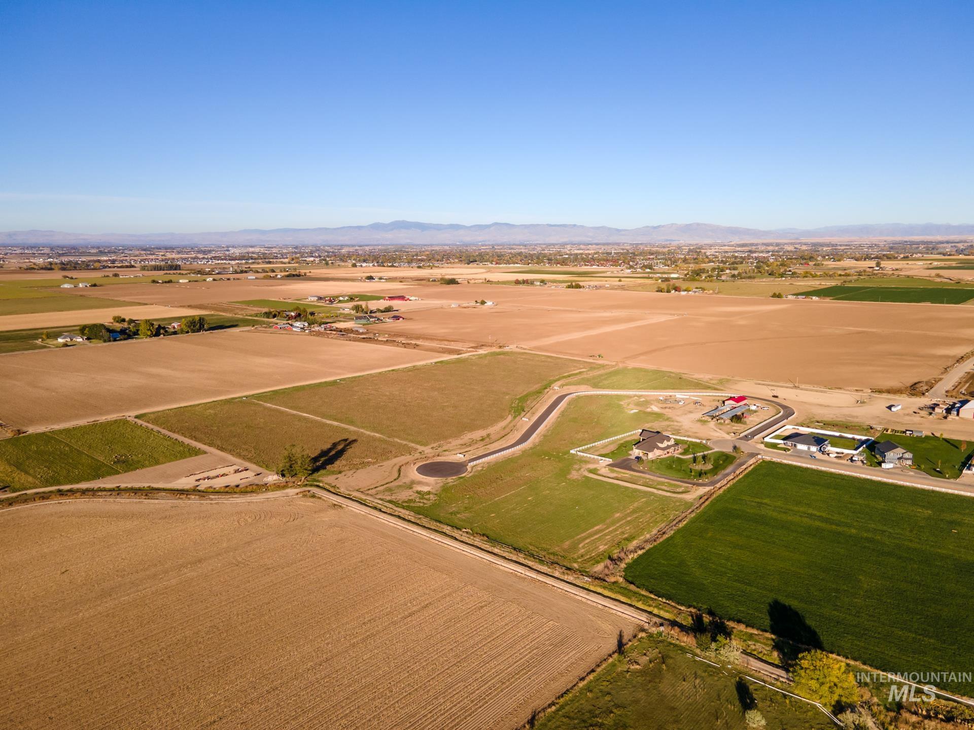 View of property location with rural landscape and a mountain backdrop