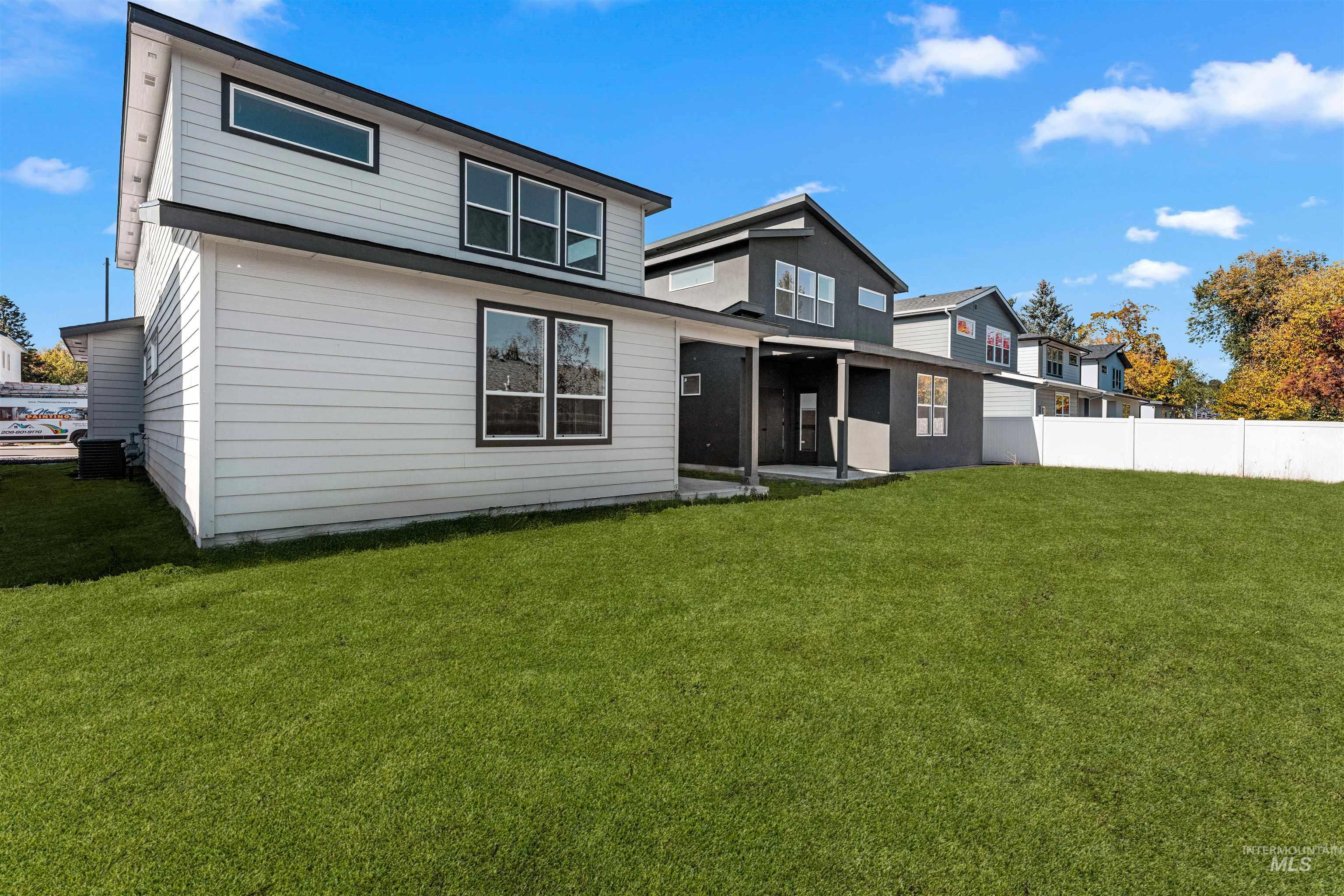 Rear view of property featuring a patio