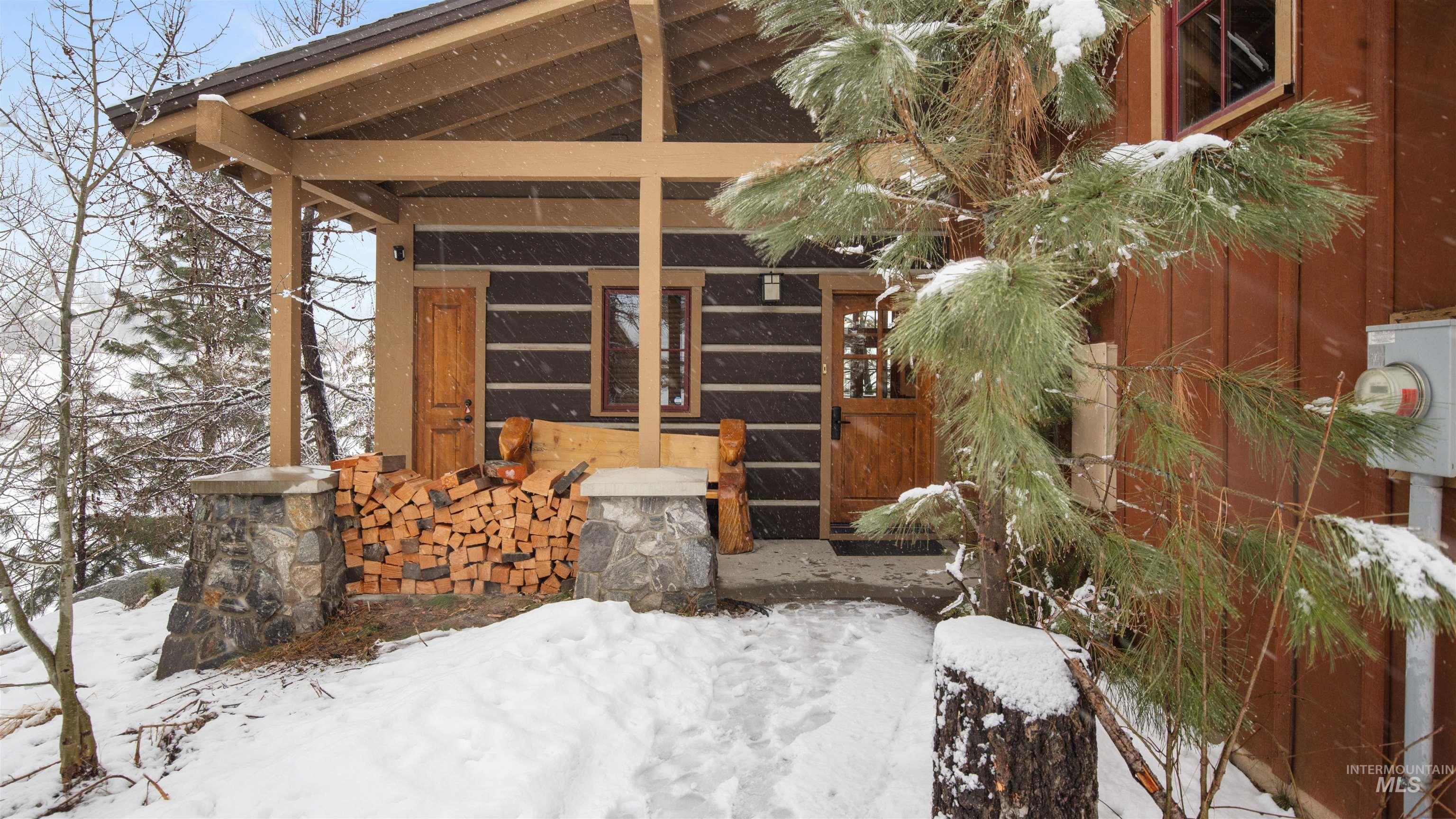 View of snow covered property entrance
