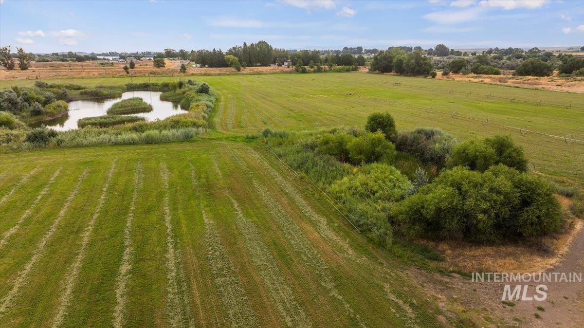 Overview of rural landscape with a nearby body of water
