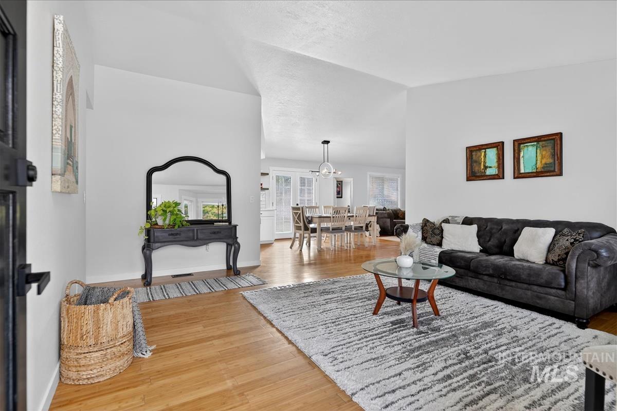 Living area with light wood finished floors