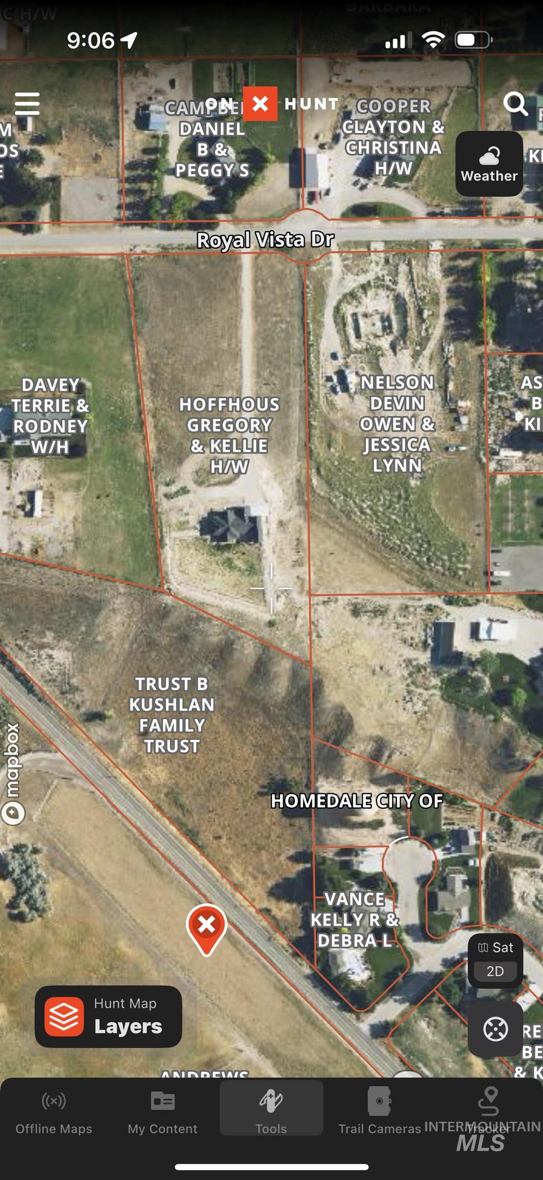 Aerial overview of property's location featuring property boundaries highlighted