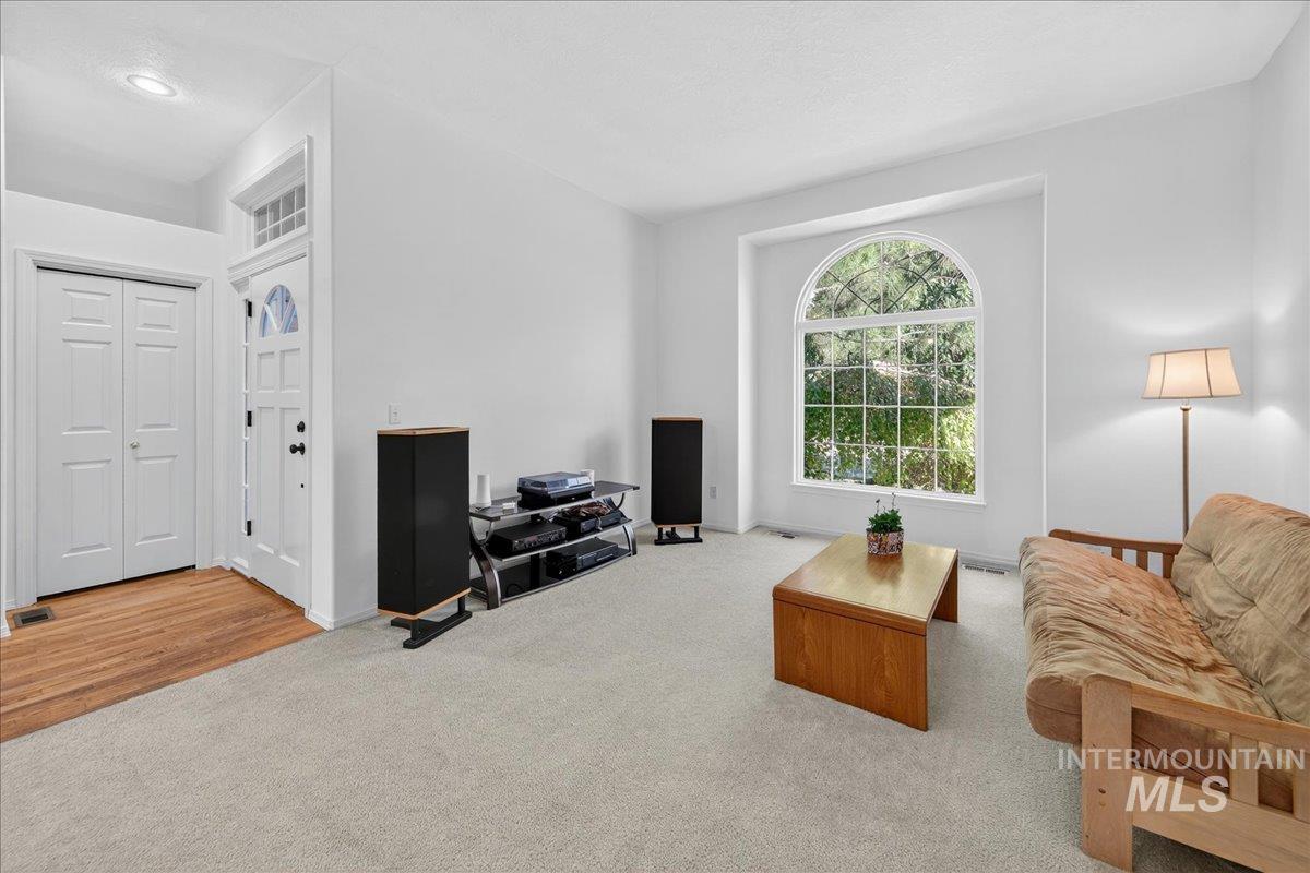 Living room featuring carpet flooring
