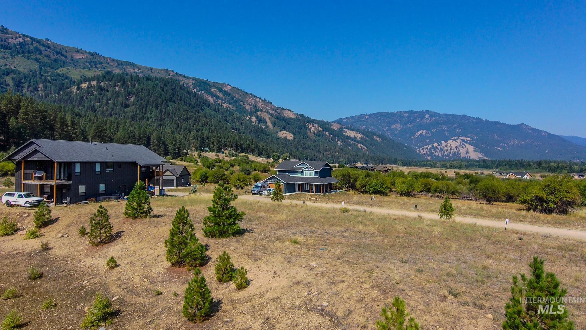 View of mountain backdrop featuring rural landscape