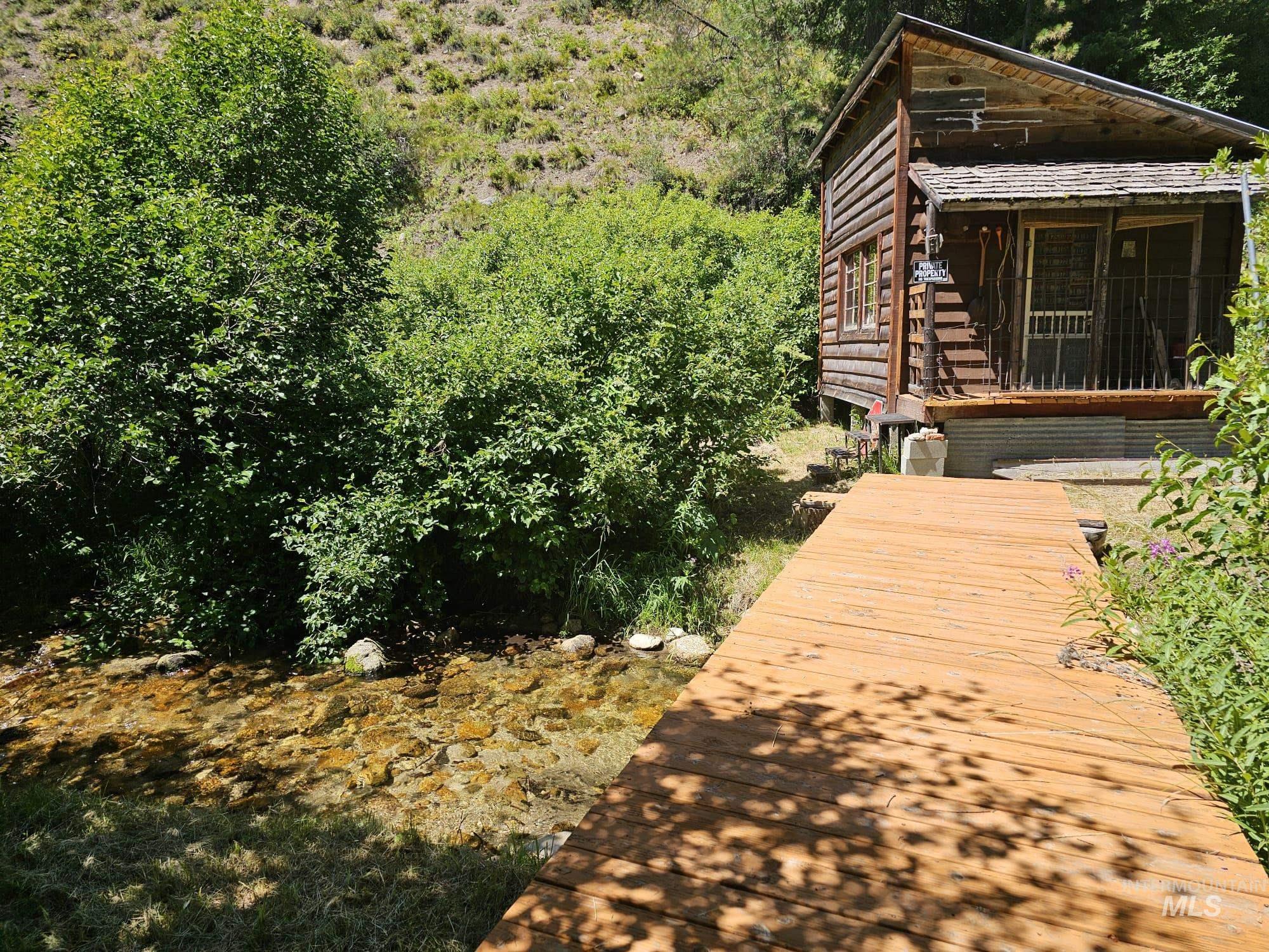 View of home's exterior featuring a wooded view