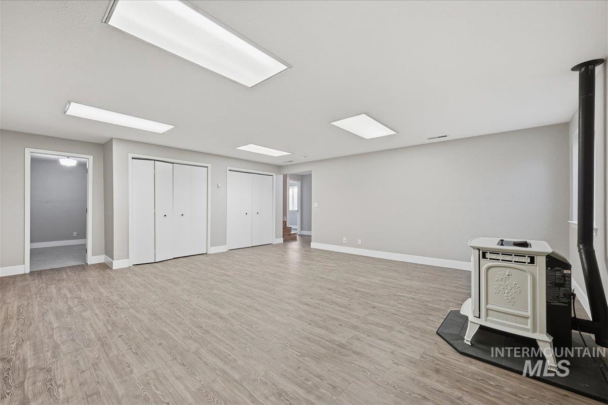 Interior space featuring light wood finished floors and baseboards