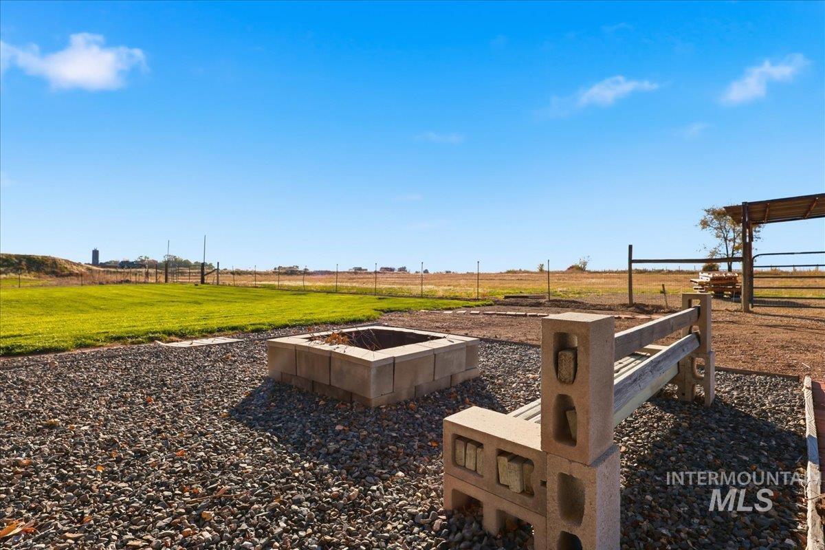 View of yard with a view of rural / pastoral area