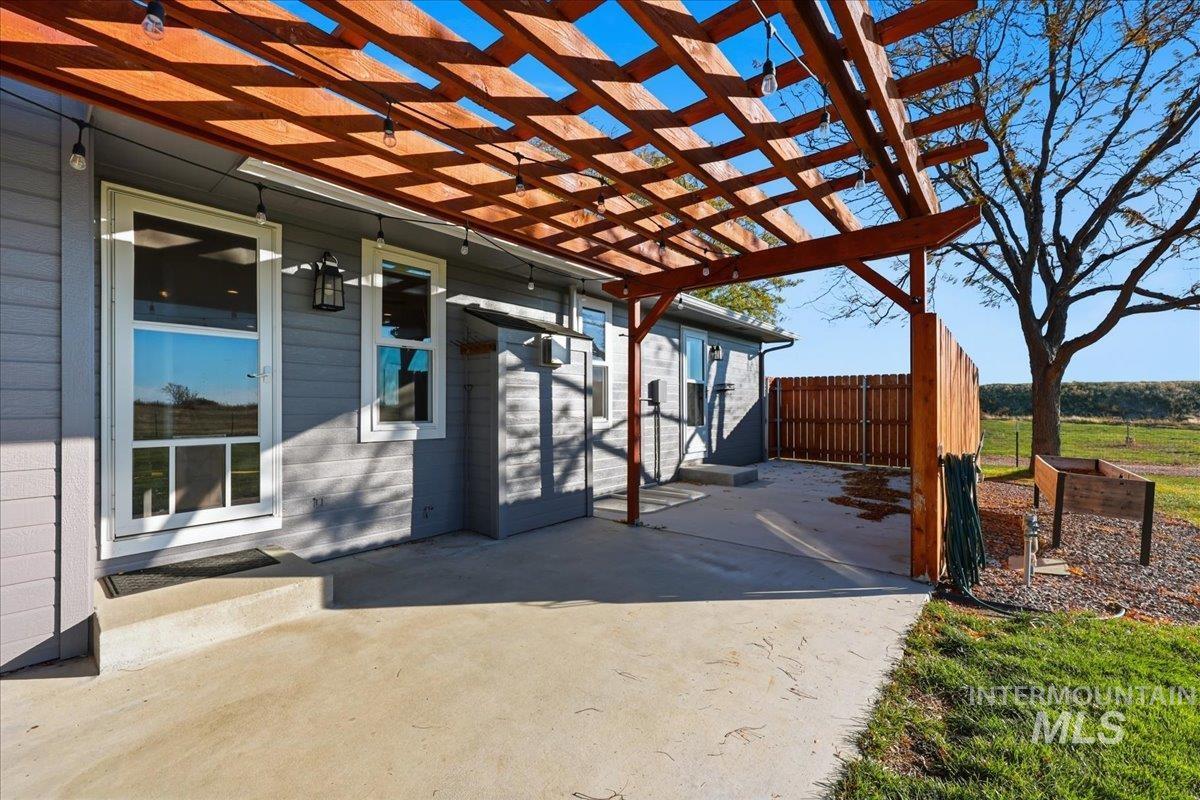 View of patio with a pergola