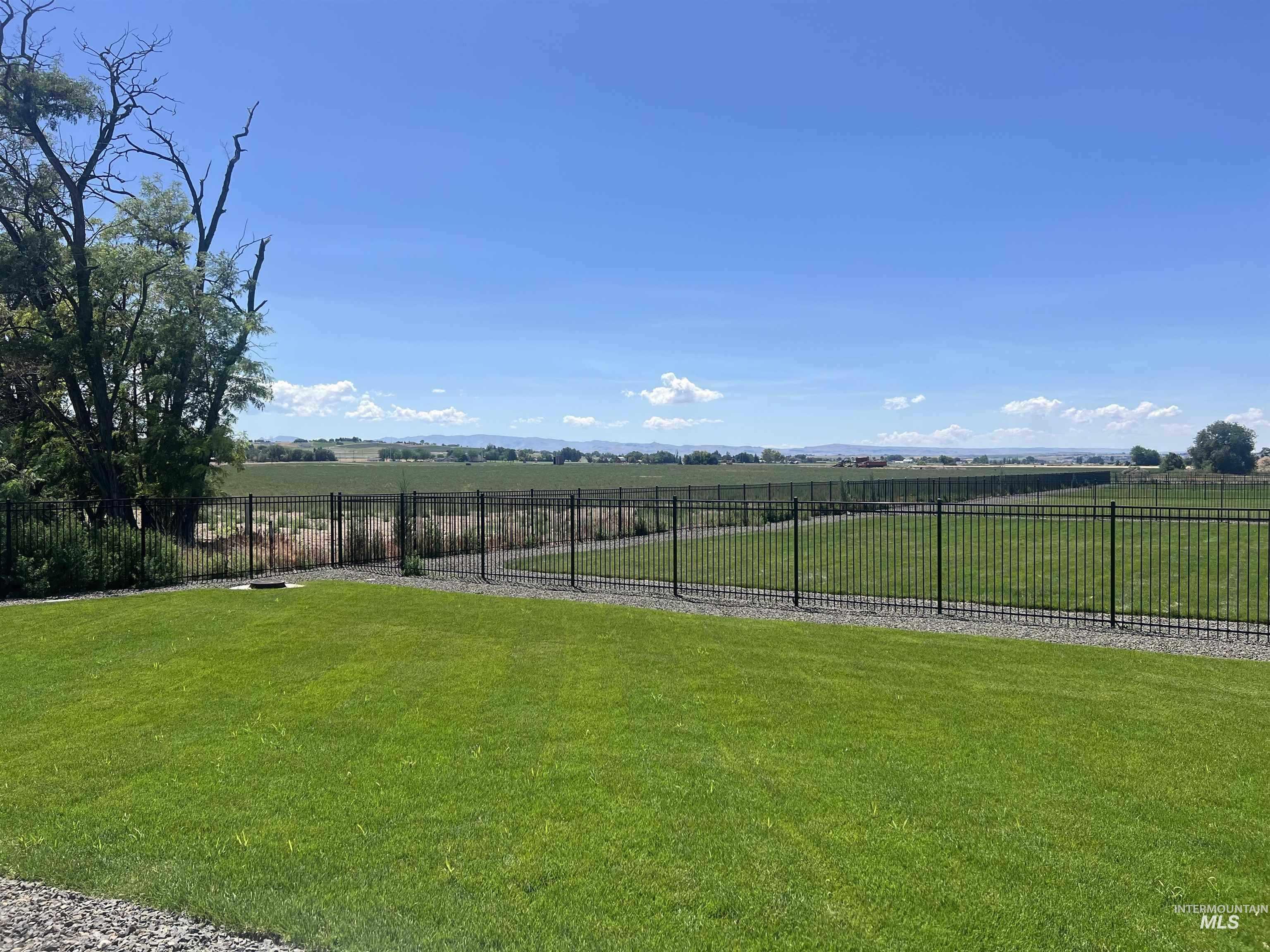 View of yard with a view of countryside