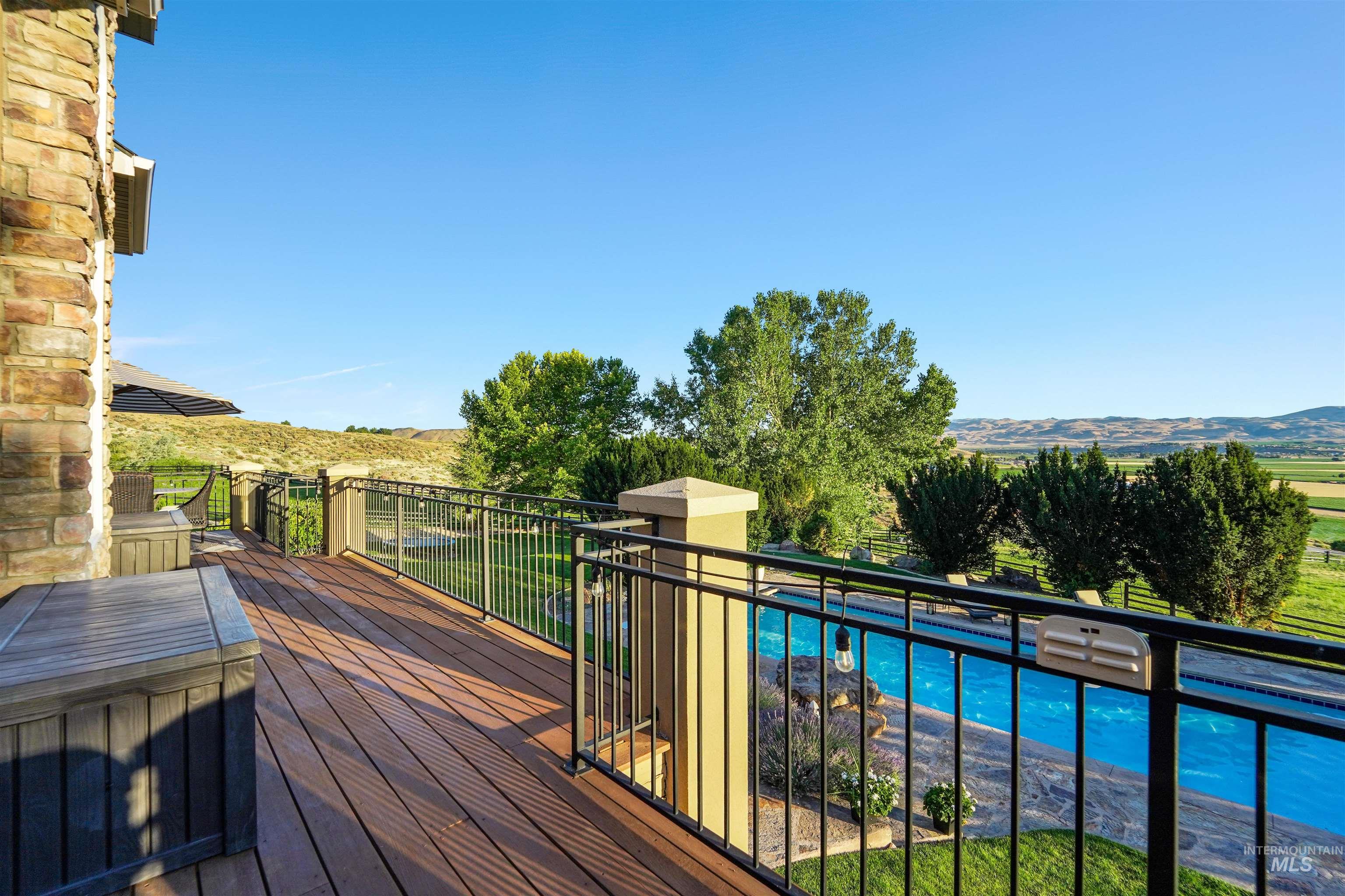 Wooden deck featuring a mountain view