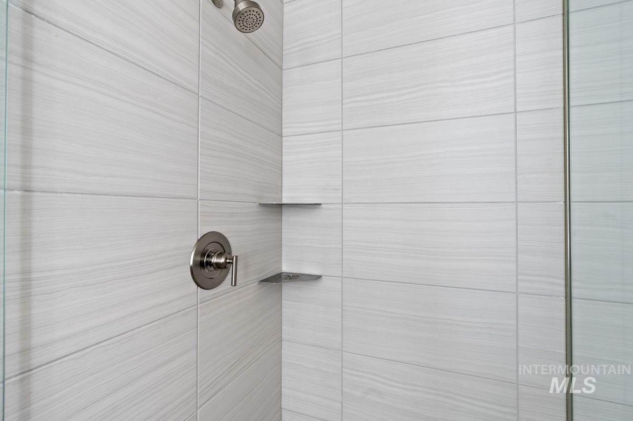 Bathroom view of tiled shower