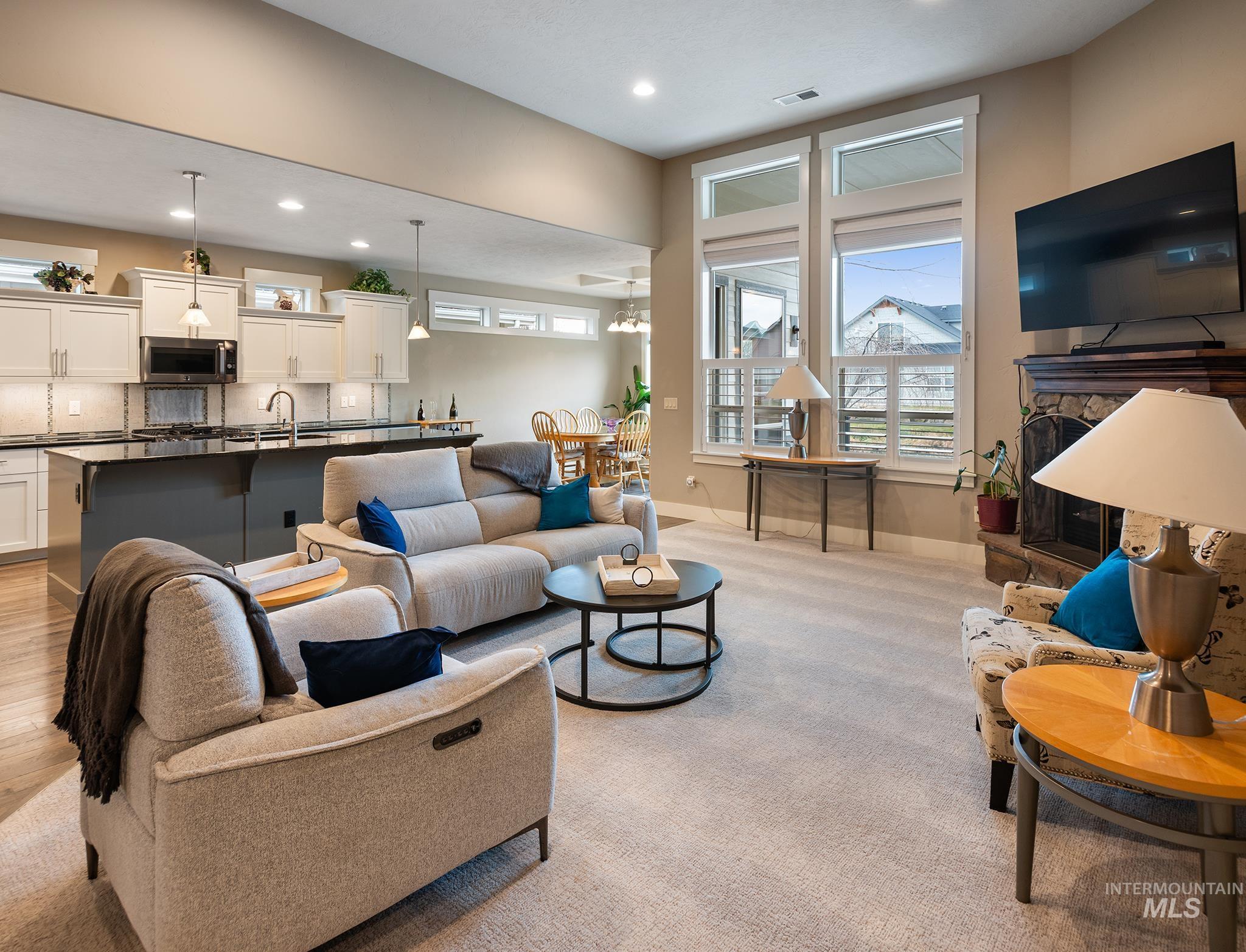 Living area with recessed lighting and healthy amount of natural light