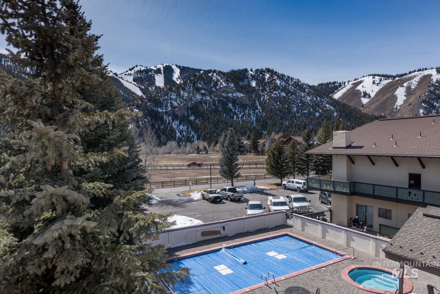 View of pool featuring a mountain view