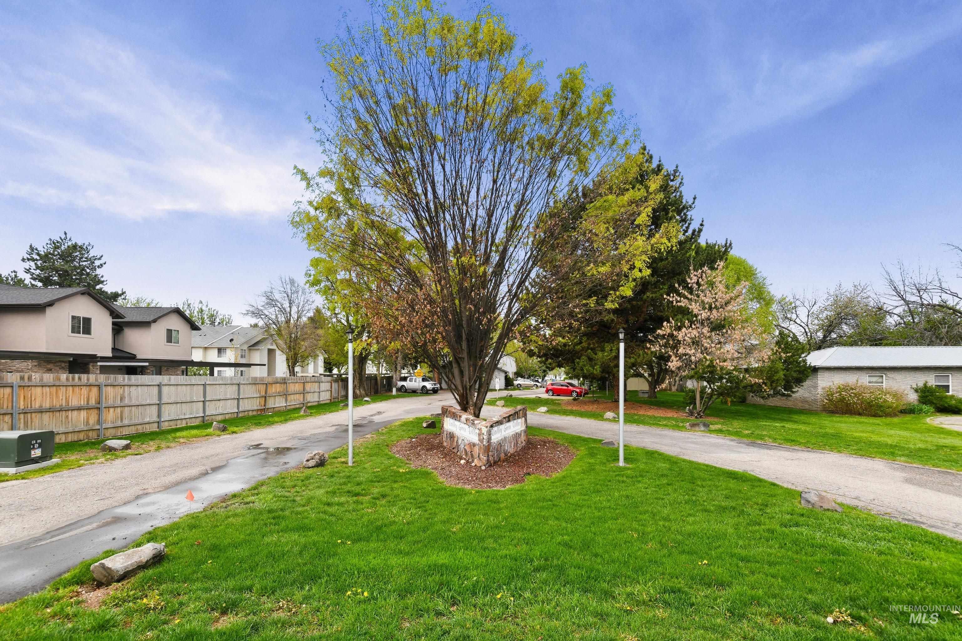 View of asphalt street with a residential view