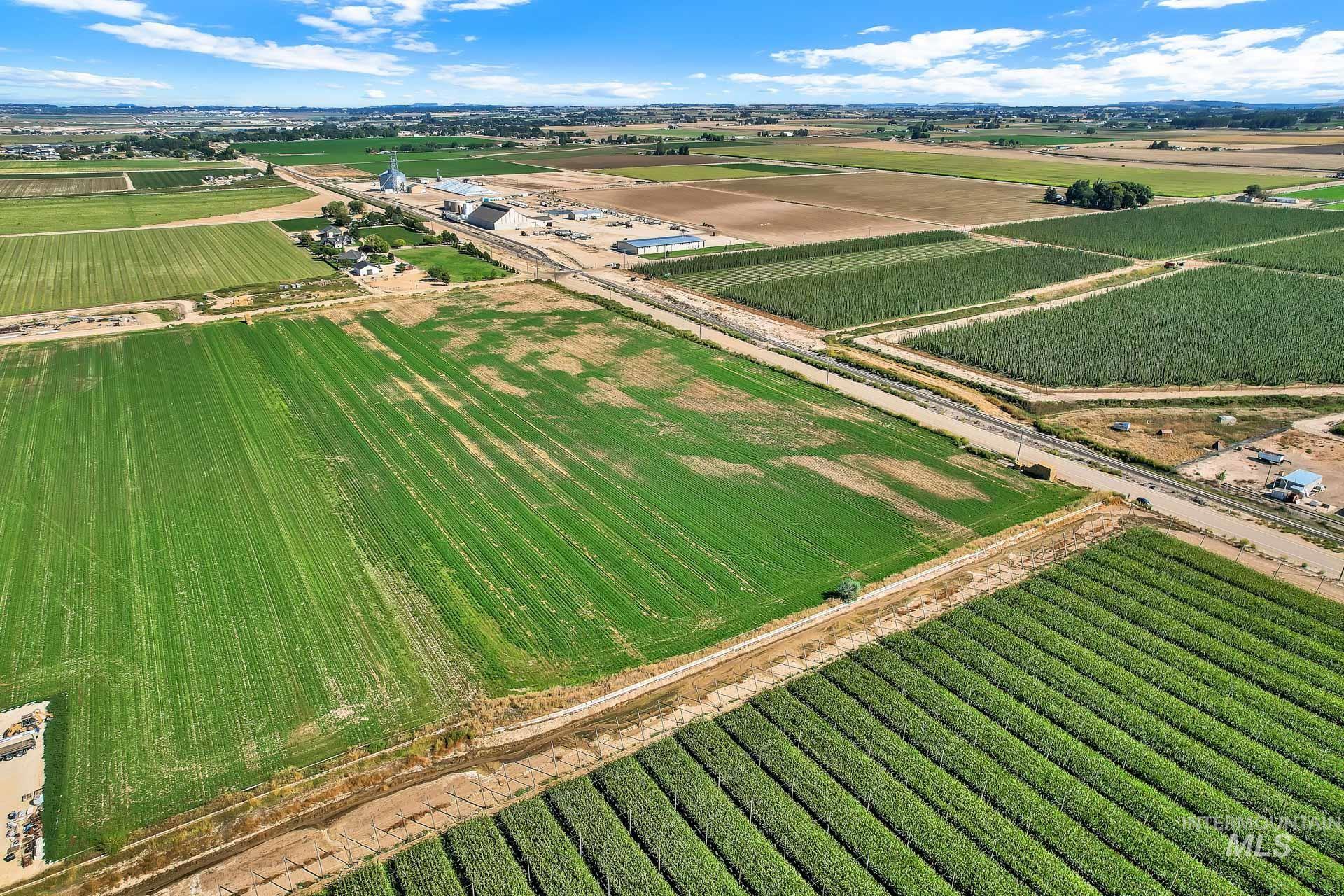 Aerial view of sparsely populated area featuring farmland