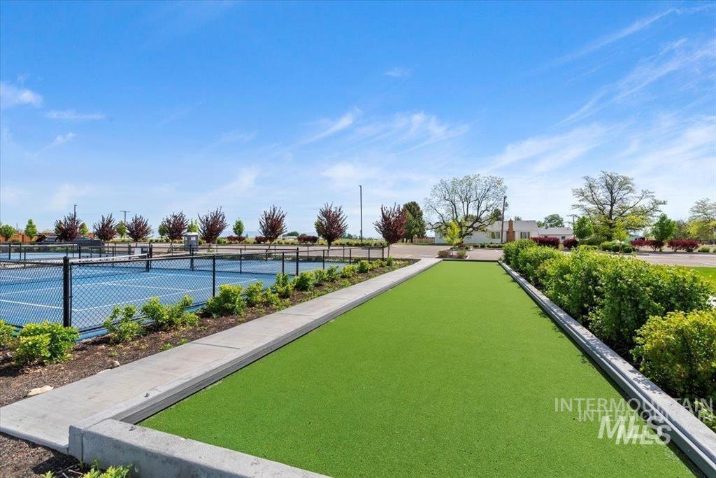 View of the community featuring a Bocce Ball area and a pickle ball court