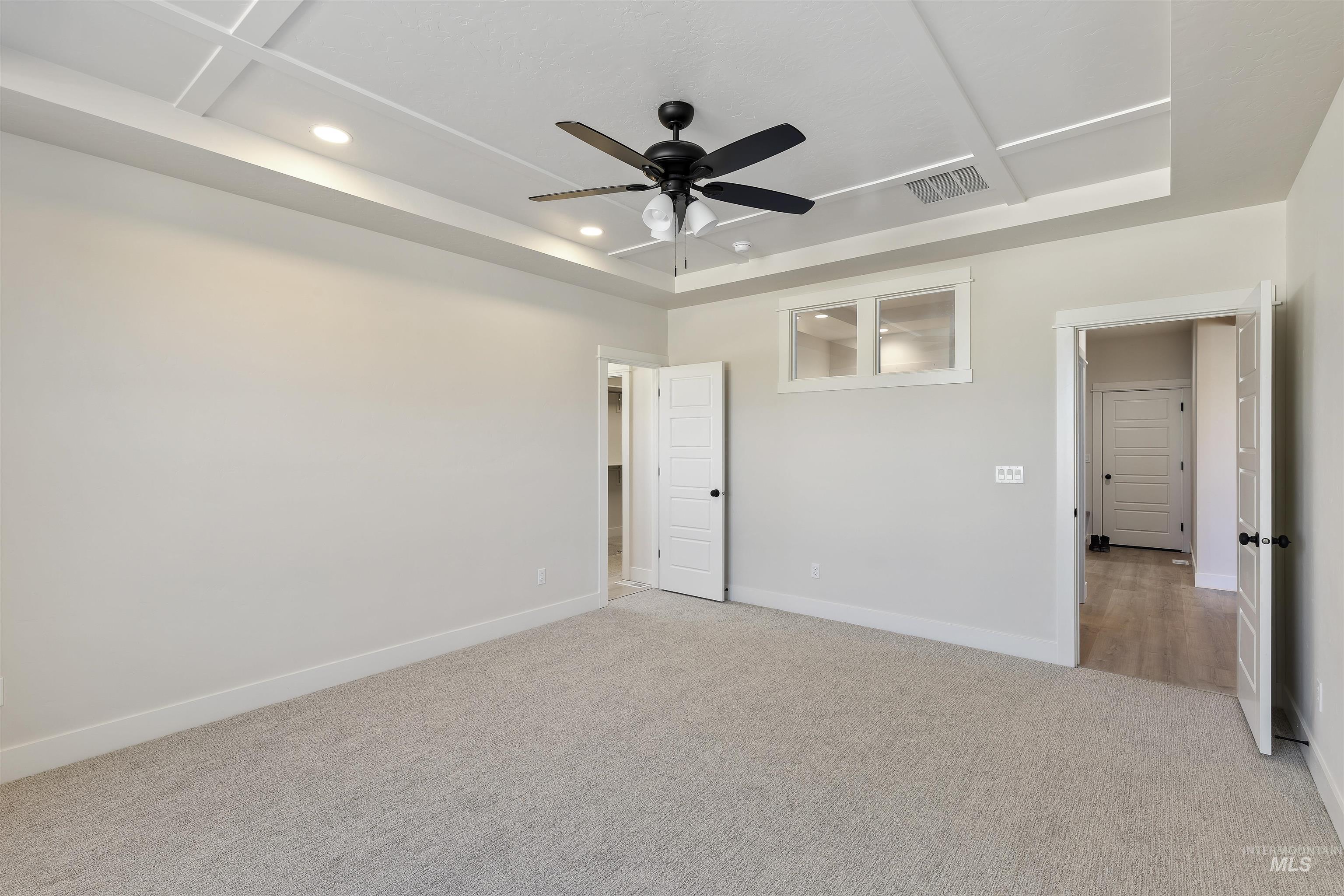 Unfurnished bedroom with light carpet, recessed lighting, and ceiling fan