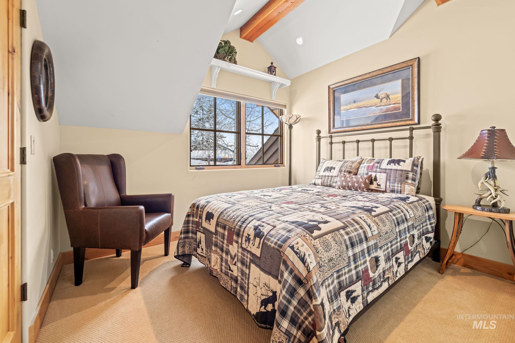 Bedroom featuring light colored carpet and recessed lighting