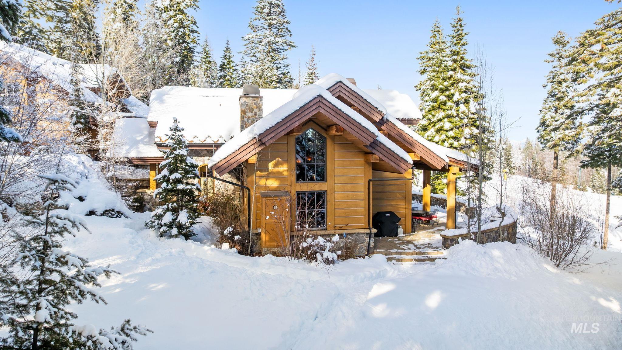 View of front of house featuring a chimney