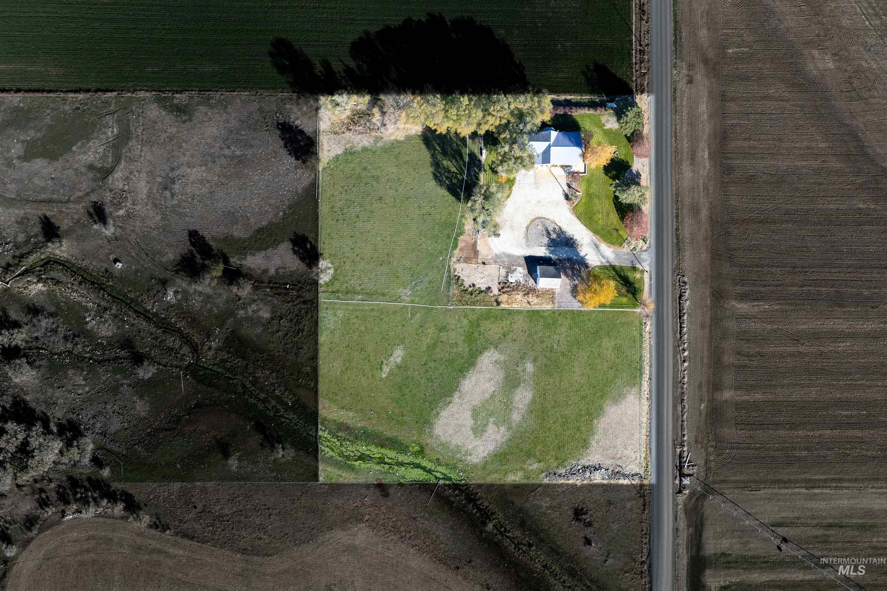 Aerial overview of property's location featuring rural landscape