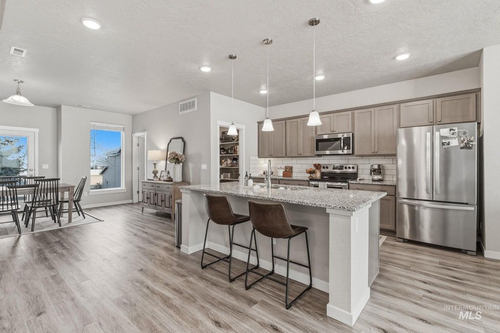 Photo of 3126 N Network Lane, Boise, ID 83704 (MLS # 98976022)