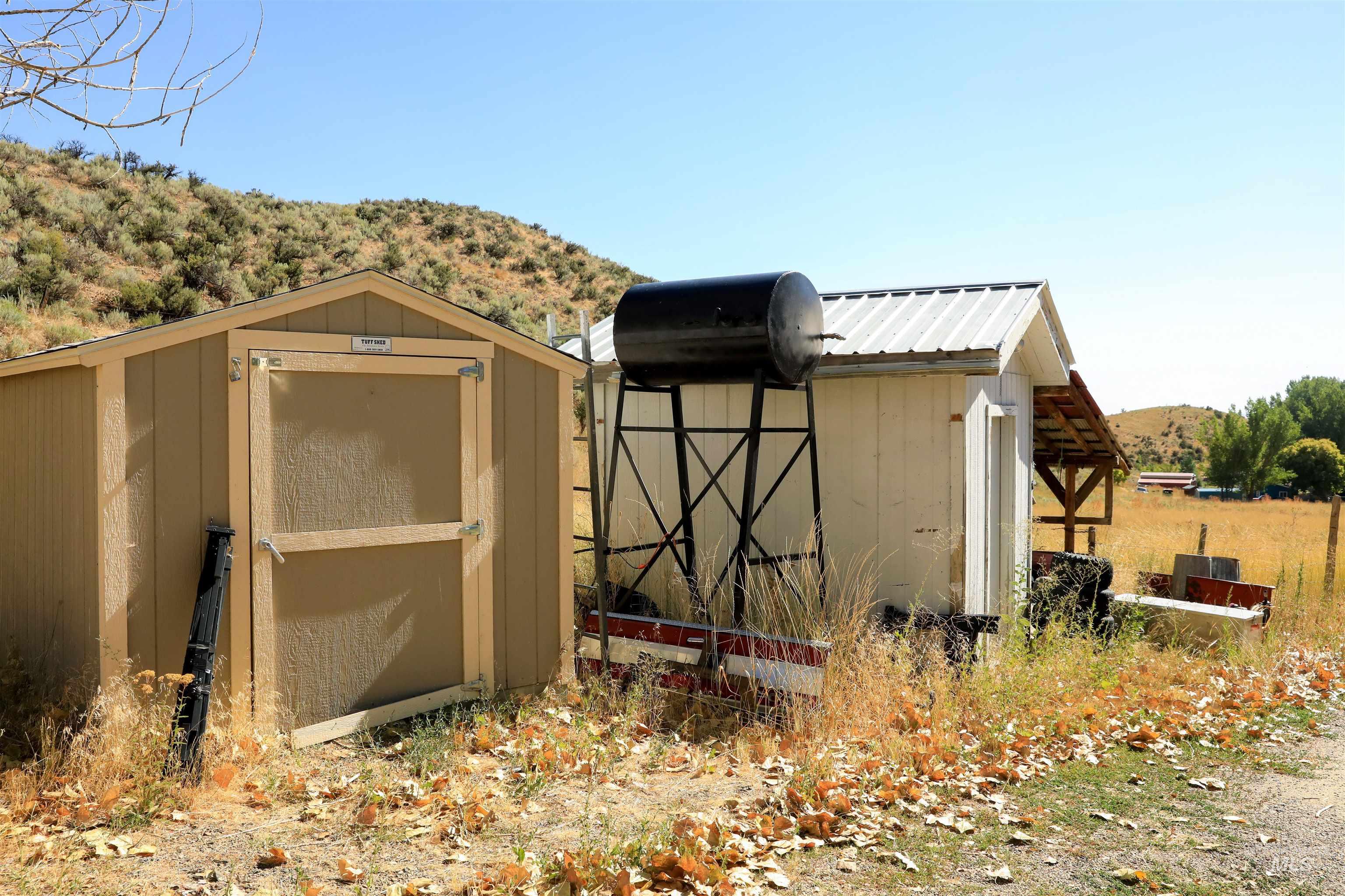 View of shed with a mountain view