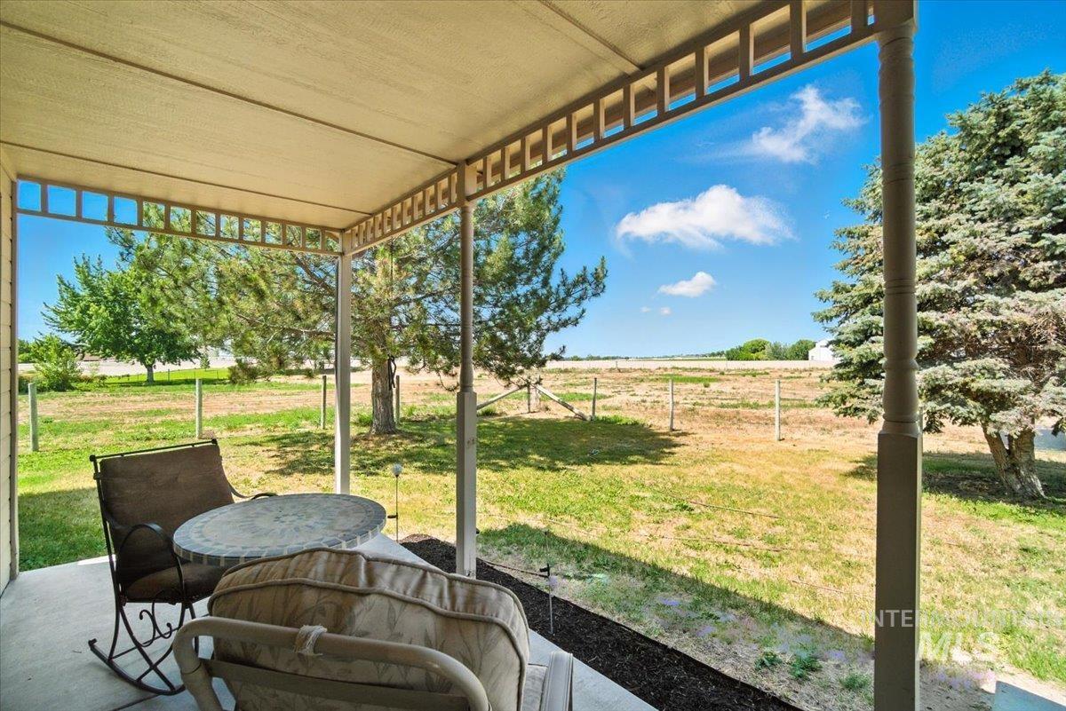 View of patio / terrace featuring a rural view