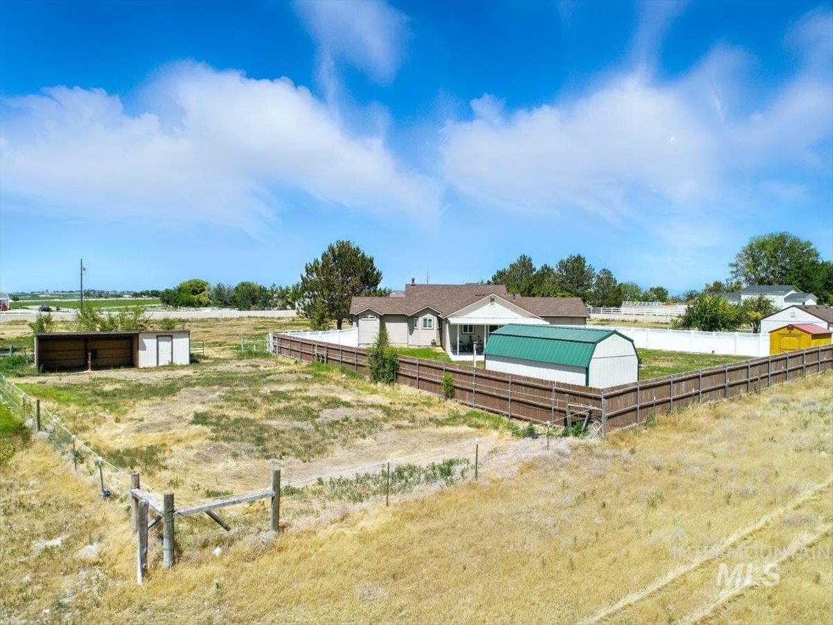 View of yard with an outbuilding and an exterior structure