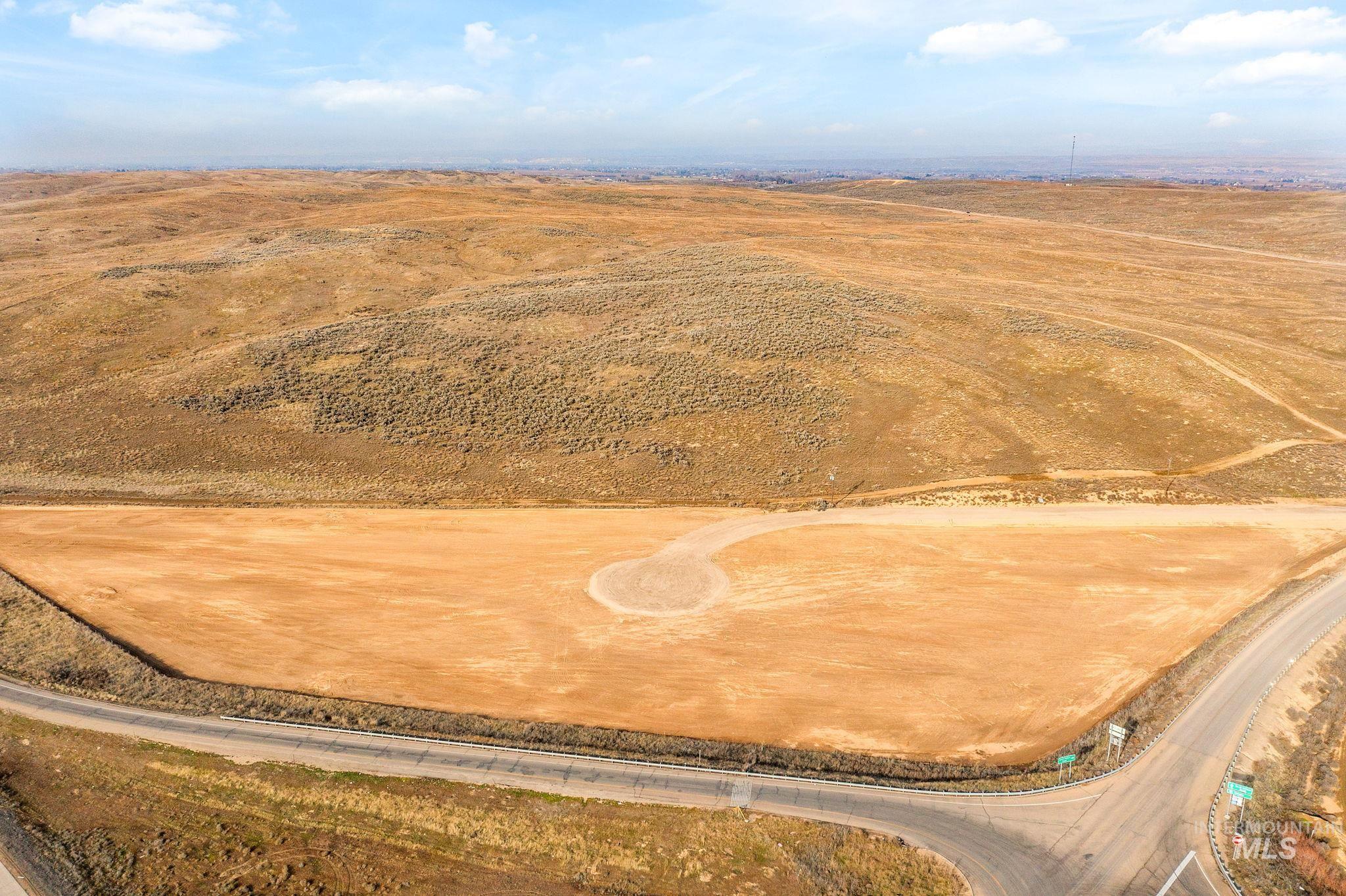 Aerial view of sparsely populated area with a desert landscape