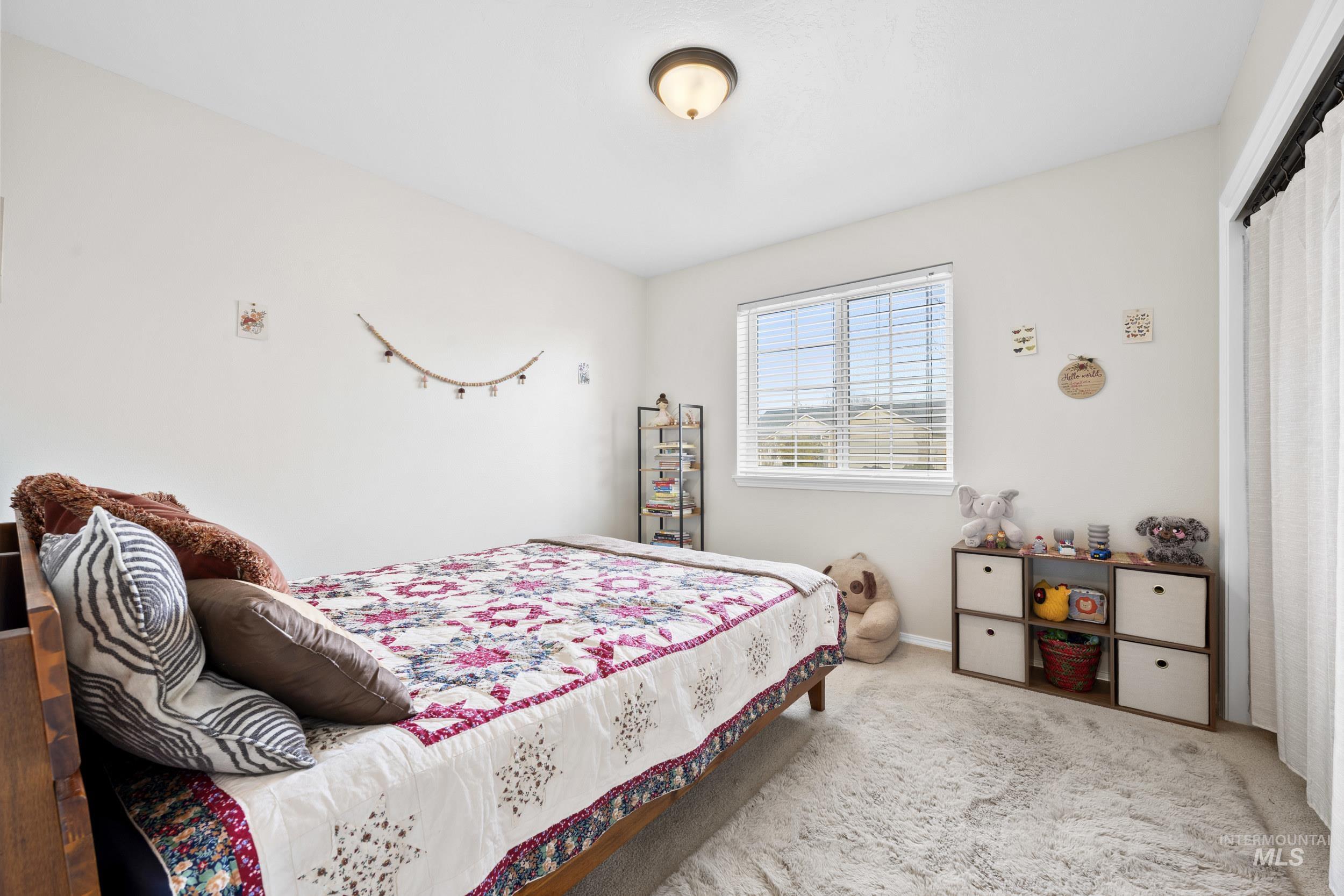 Bedroom featuring carpet floors