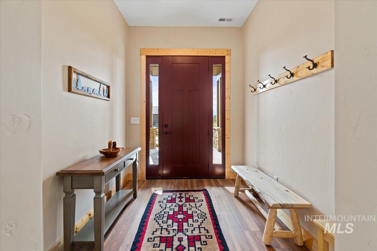 Entryway featuring wood finished floors