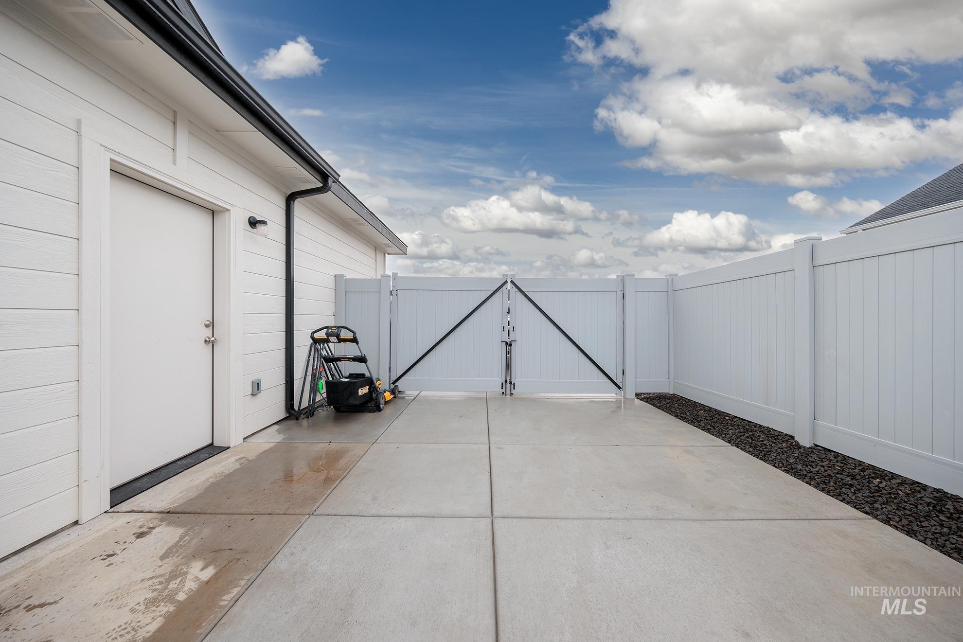 View of patio / terrace with a gate