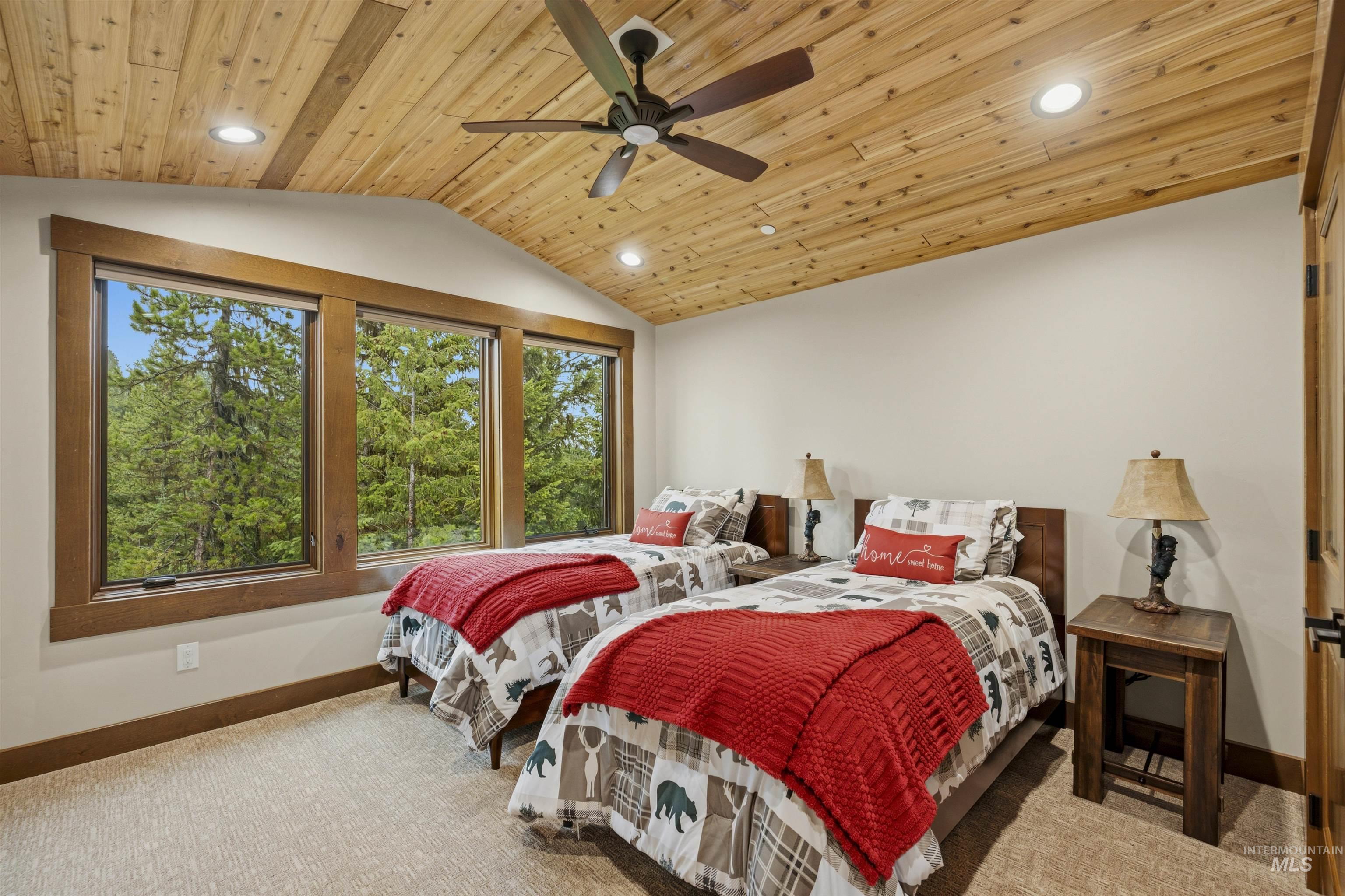 Vaulted wood-paneled ceiling with recessed lighting and ceiling fan - Bedroom Three, Second Level