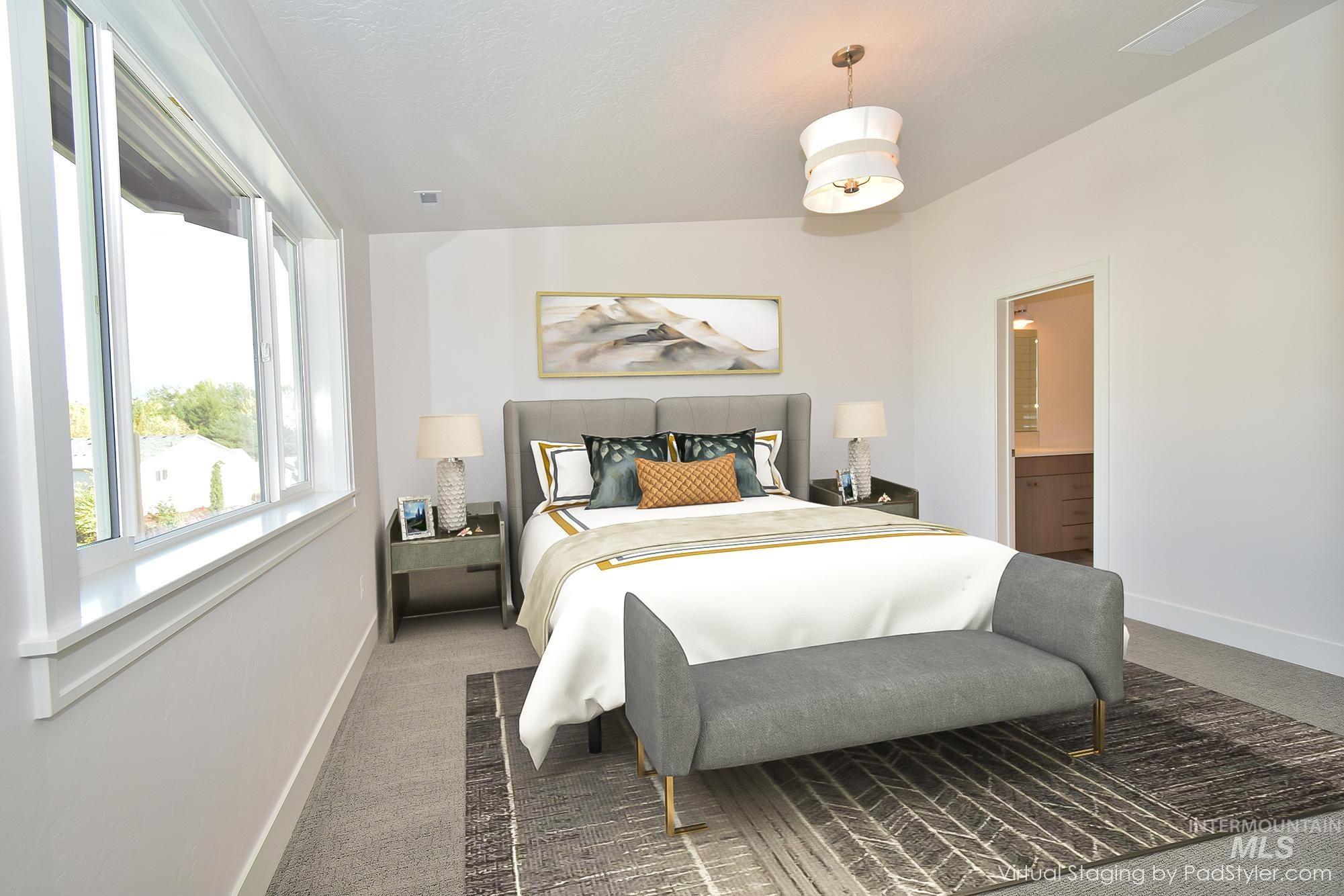 Bedroom featuring carpet flooring and connected bathroom