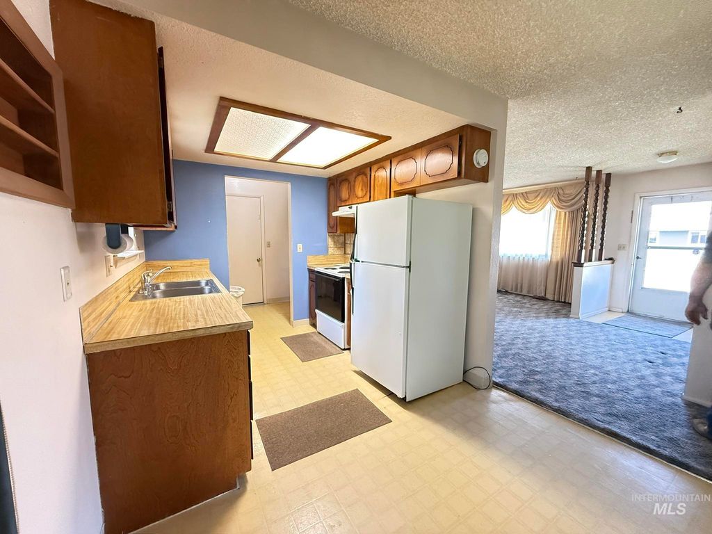 Photo of 827 NW 2nd ST, Fruitland, ID 83619 (MLS # 98986445)