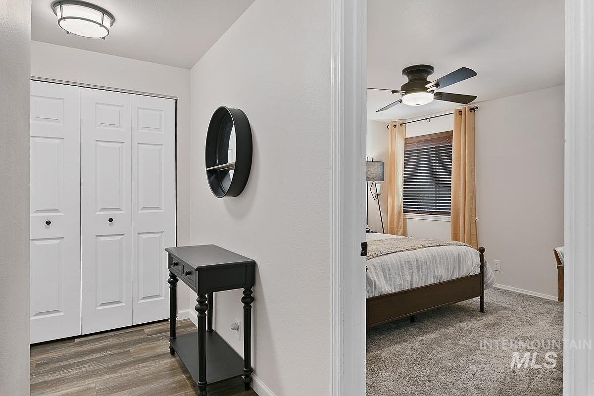 Bedroom featuring baseboards and ceiling fan