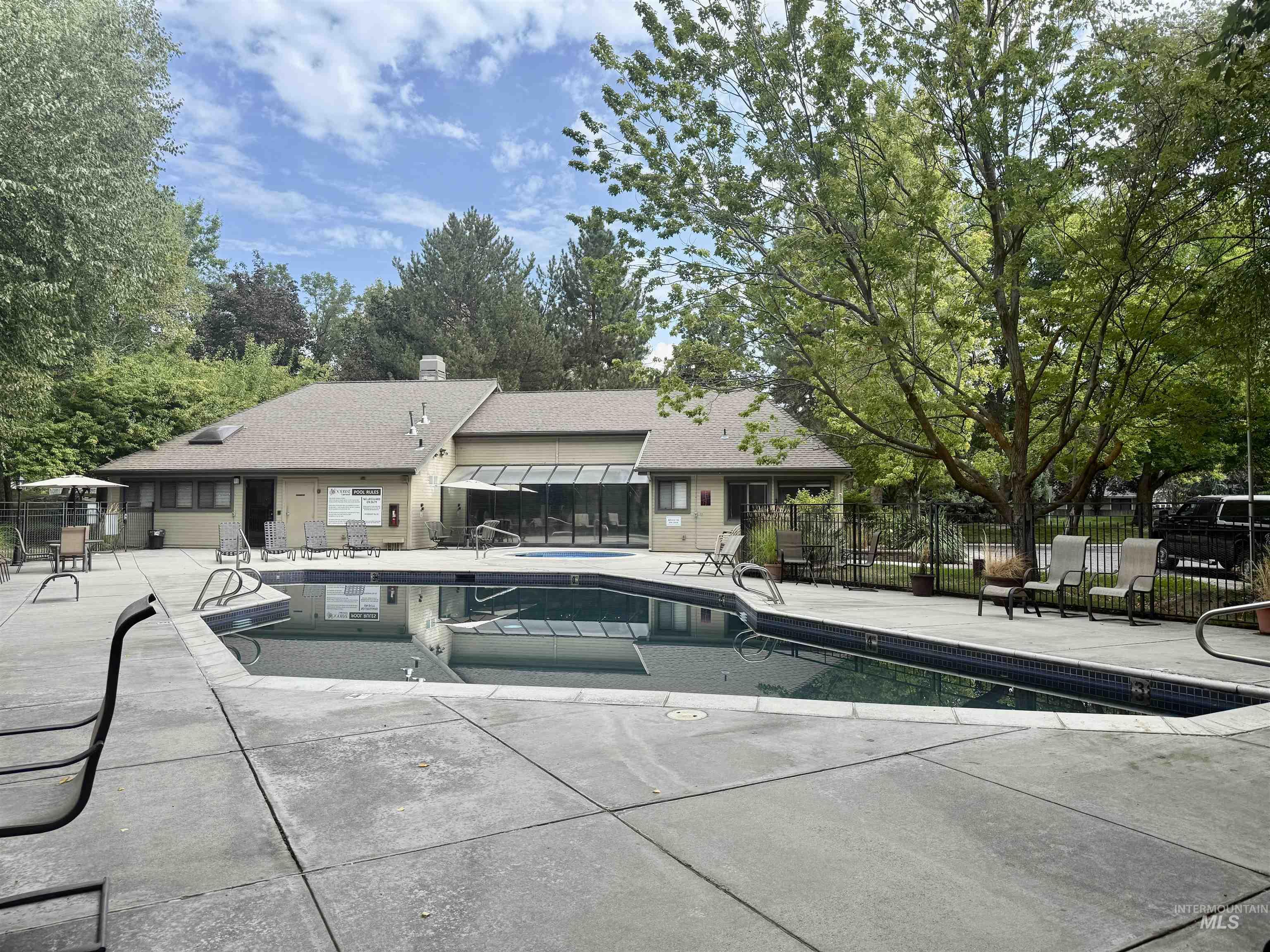 Community pool with view of scattered trees