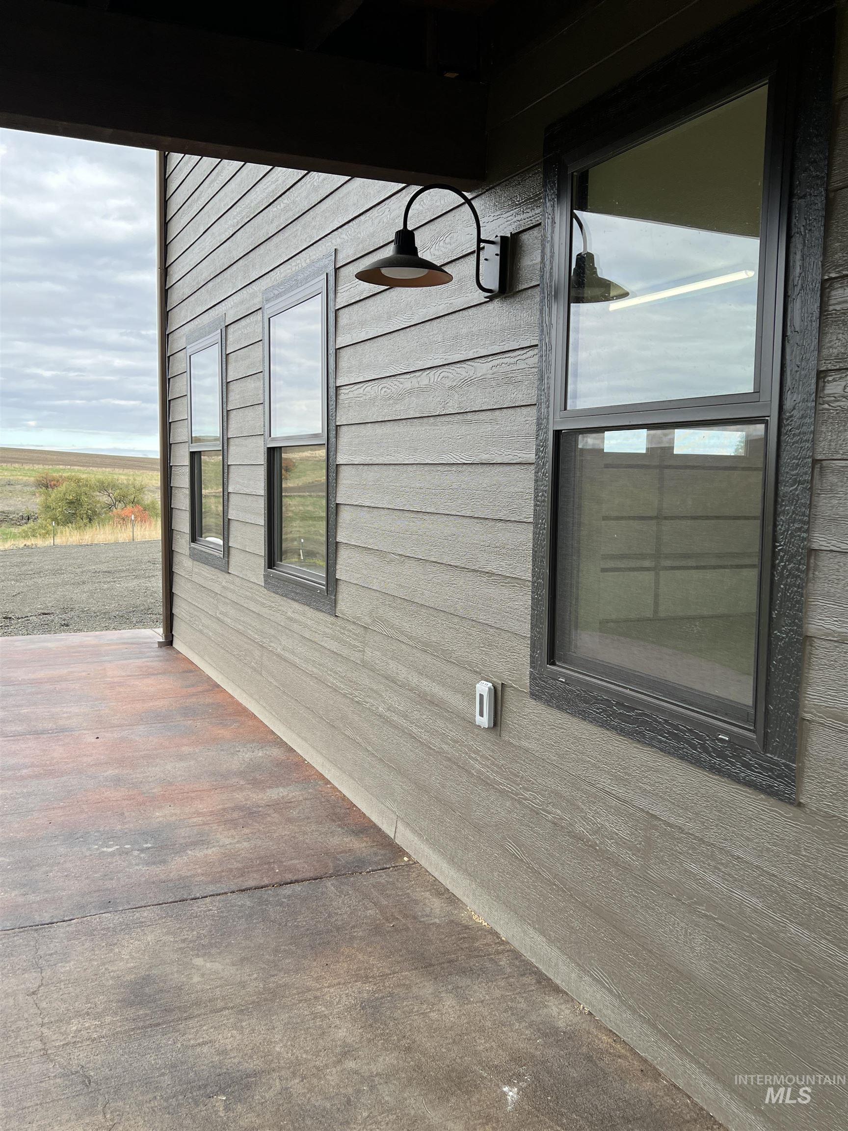 View of home's exterior featuring a patio