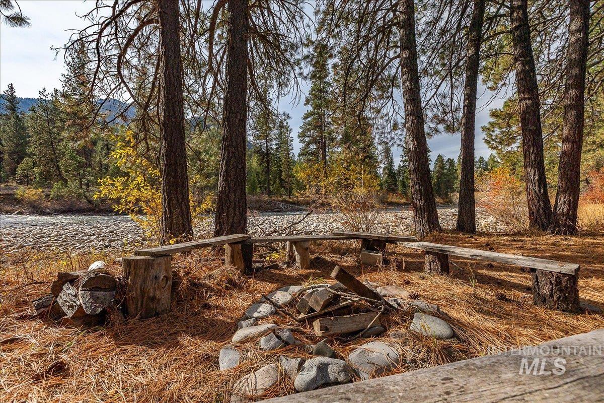 View of yard with a water view