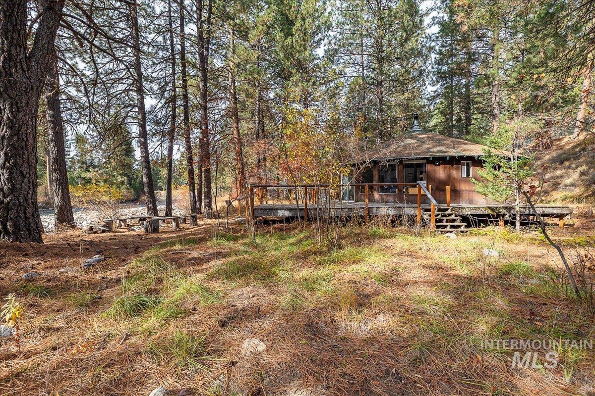 View of yard featuring a deck