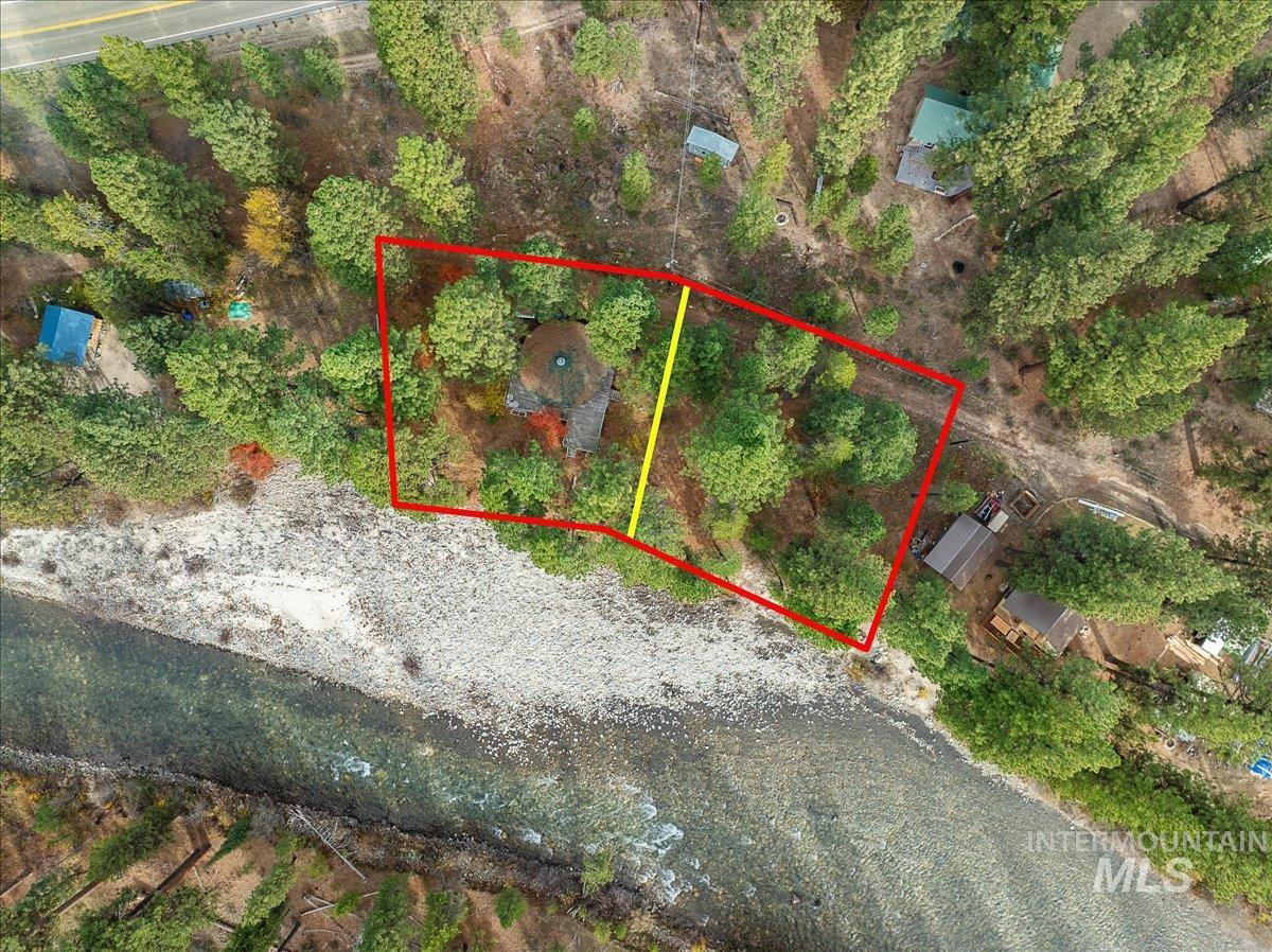 Aerial view of property and surrounding area with property boundaries highlighted