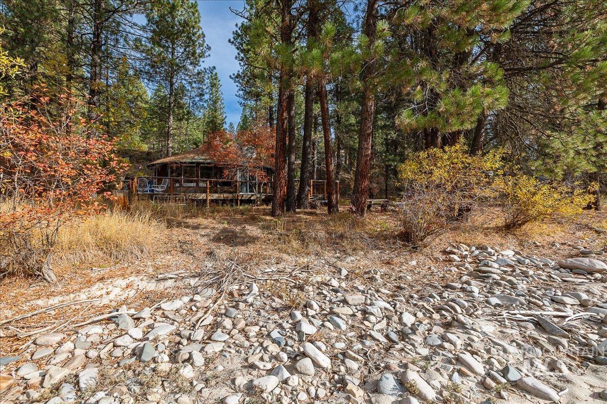 View of yard with a forest view