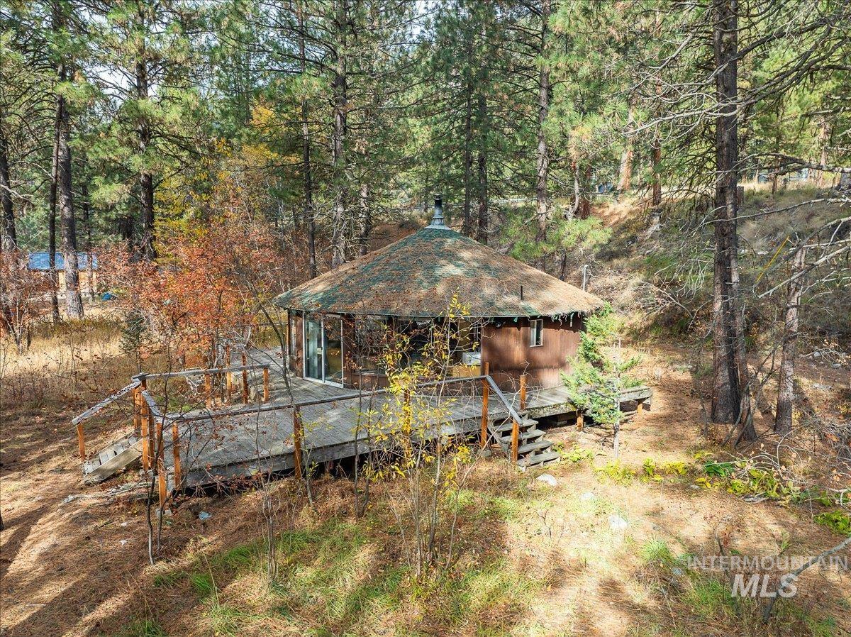 View of yard featuring a wooden deck