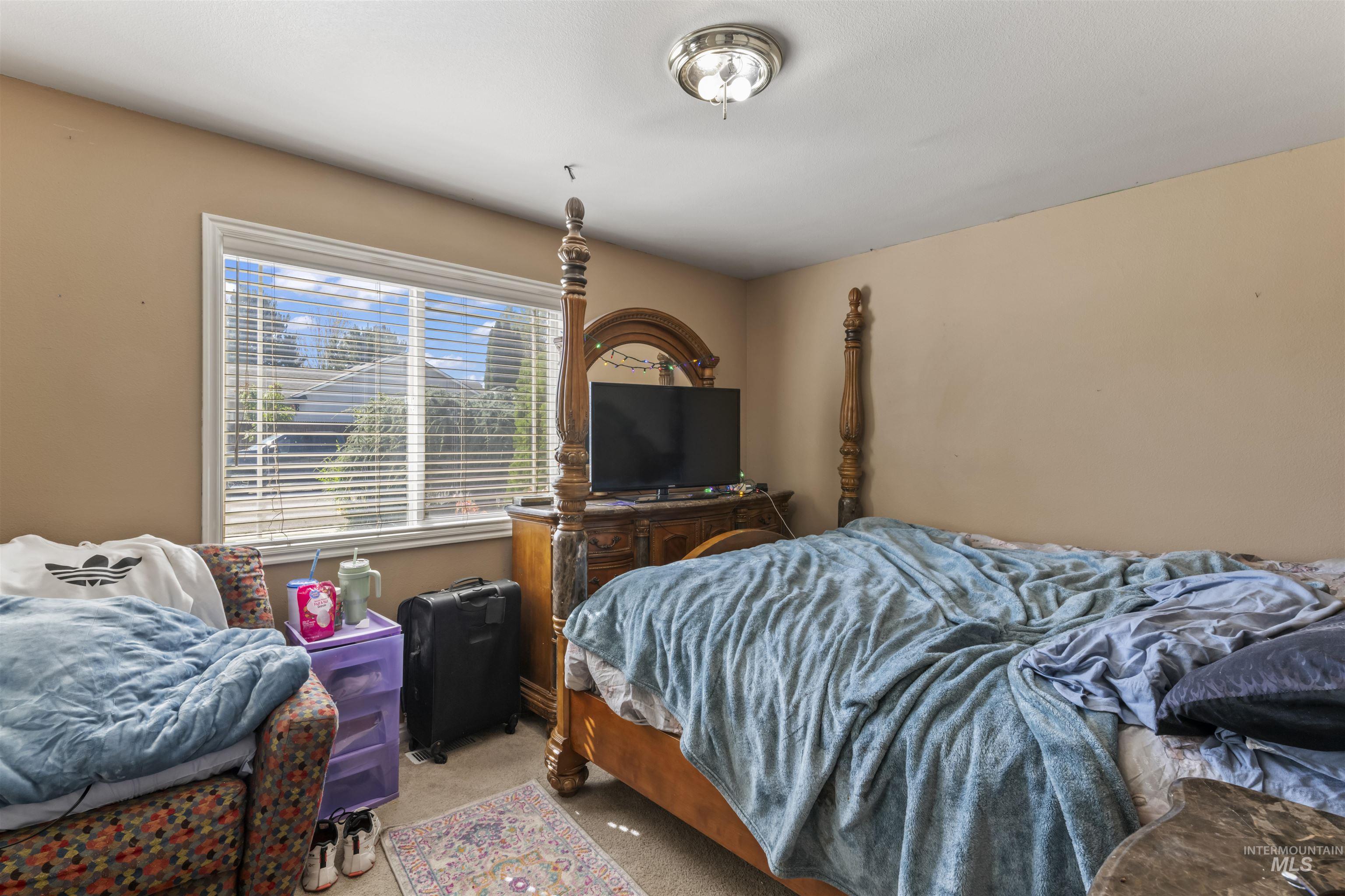 Bedroom featuring carpet
