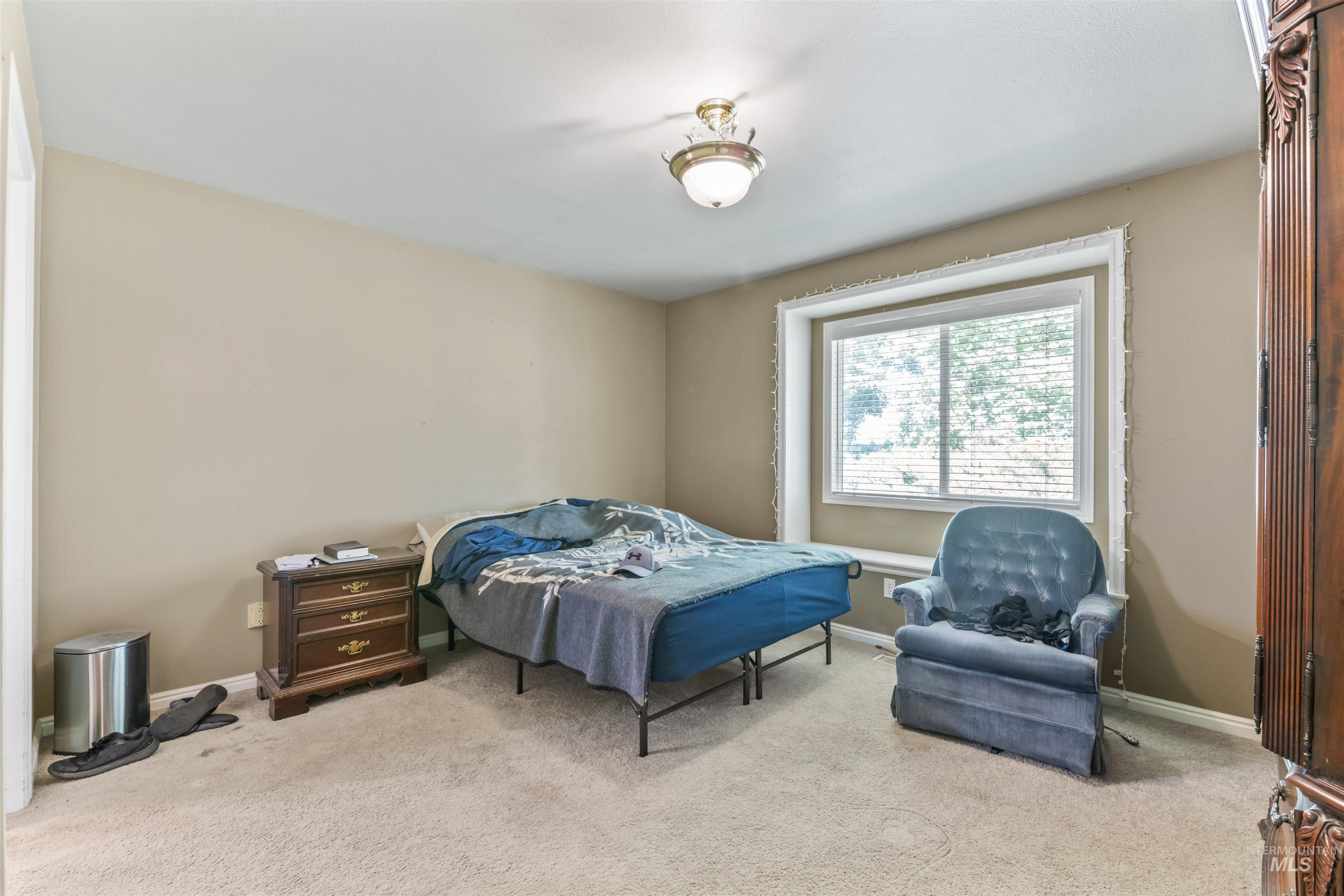 Bedroom featuring carpet flooring