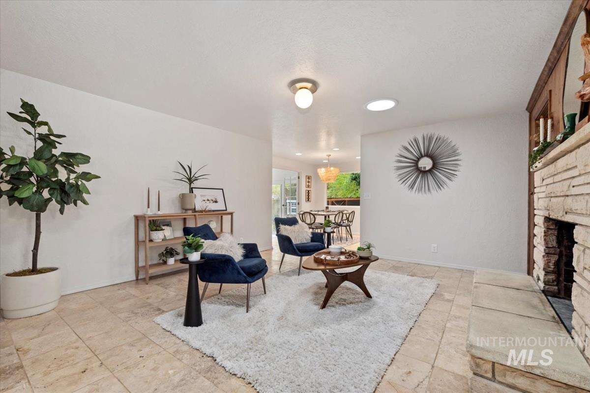 Sitting room featuring a fireplace and recessed lighting