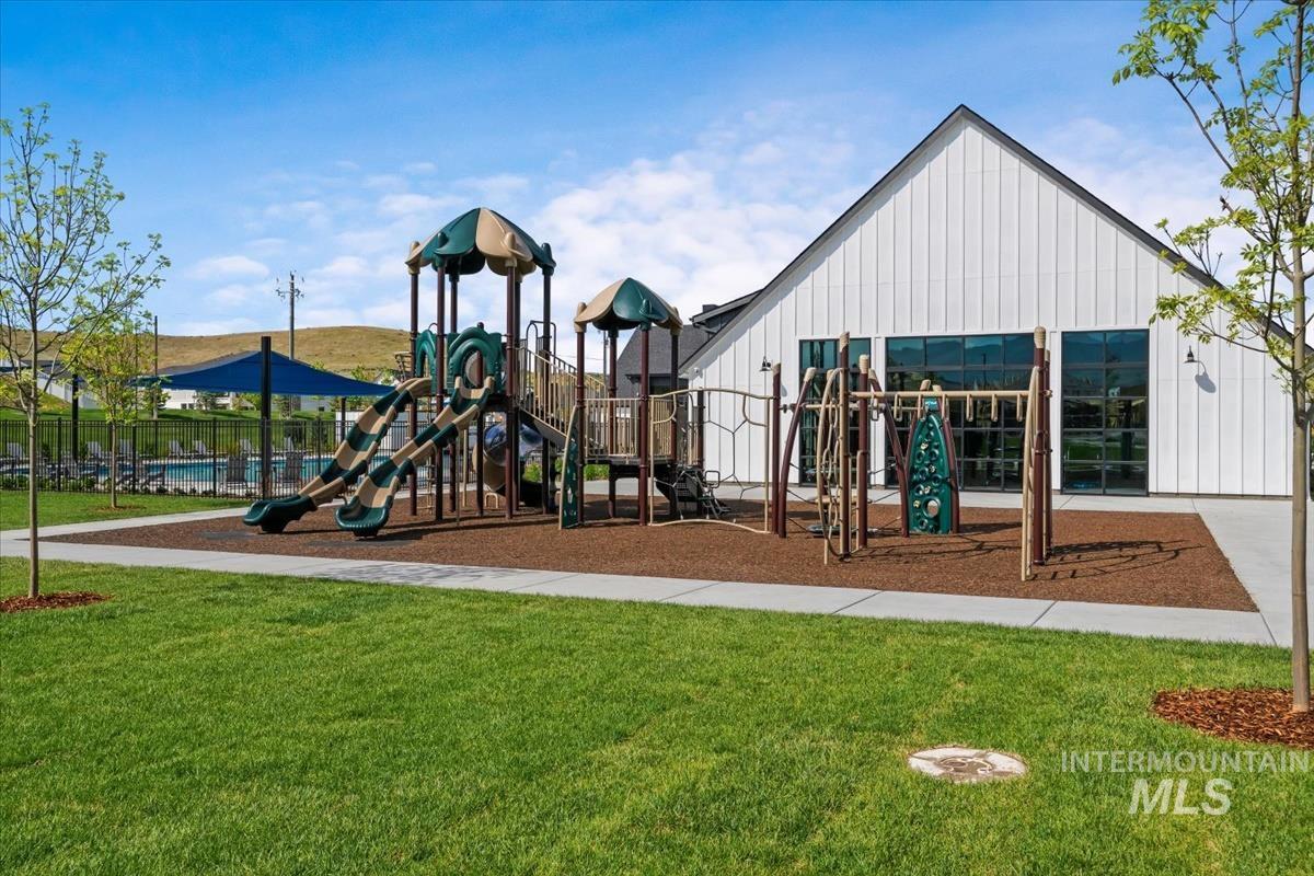 Communal playground featuring a yard